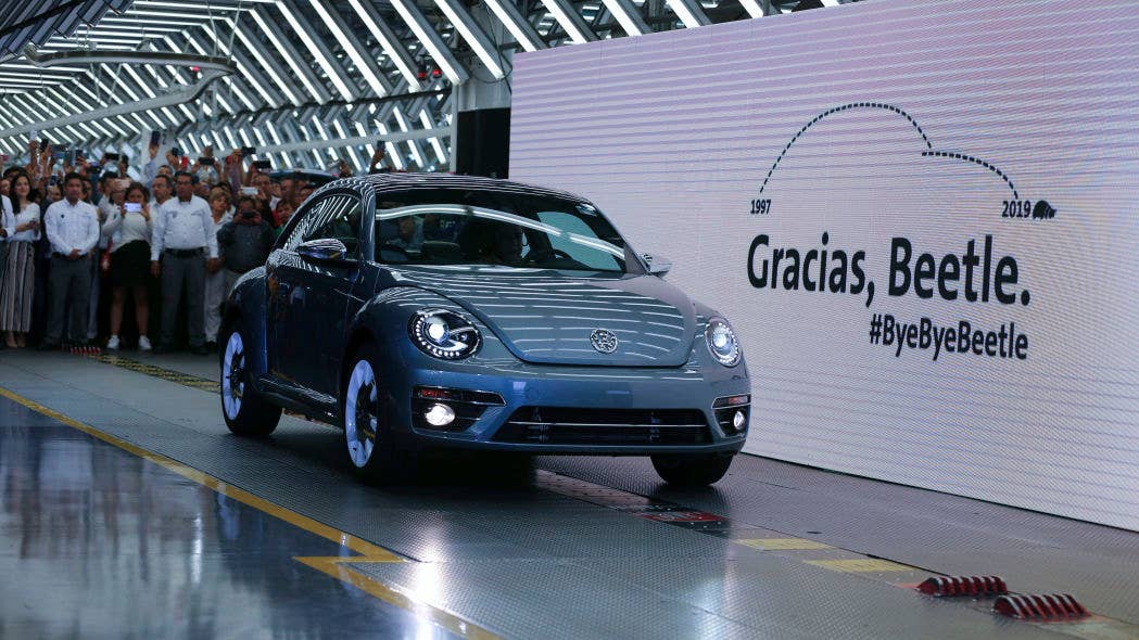 The last Volkswagen Beetle rolls through the assembly line.