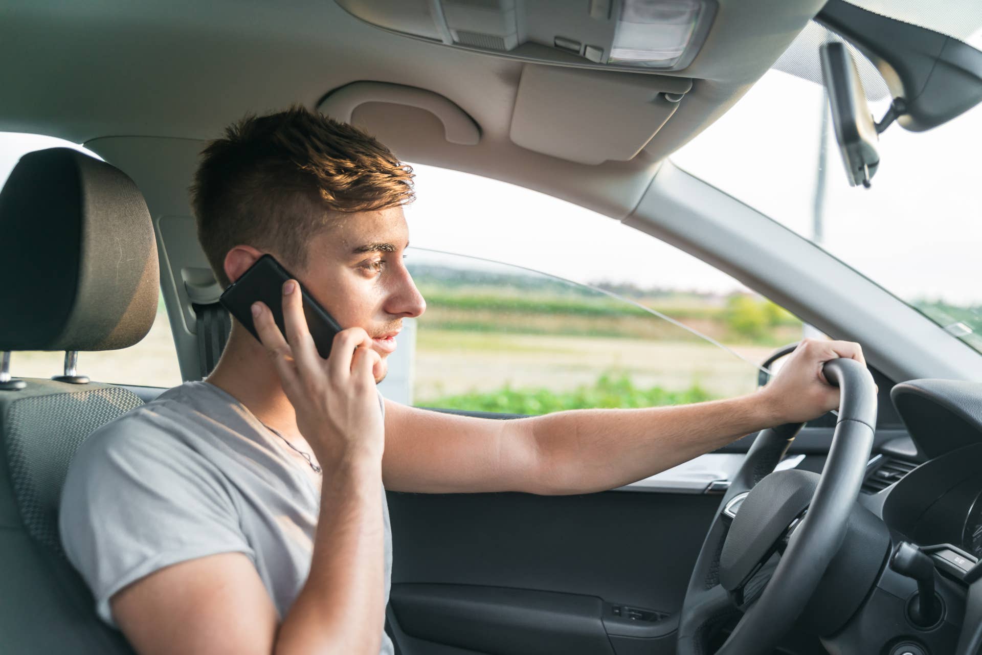 Driver Talks on Cell Phone