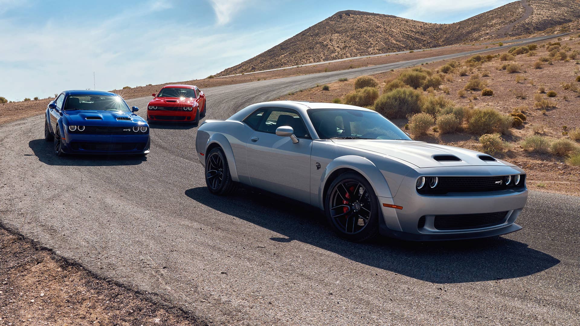 2019 Dodge Challenger Lineup: SRT Hellcat Redeye Widebody, SRT Hellcat Widebody, R/T Scat Pack Widebody (from front to back)