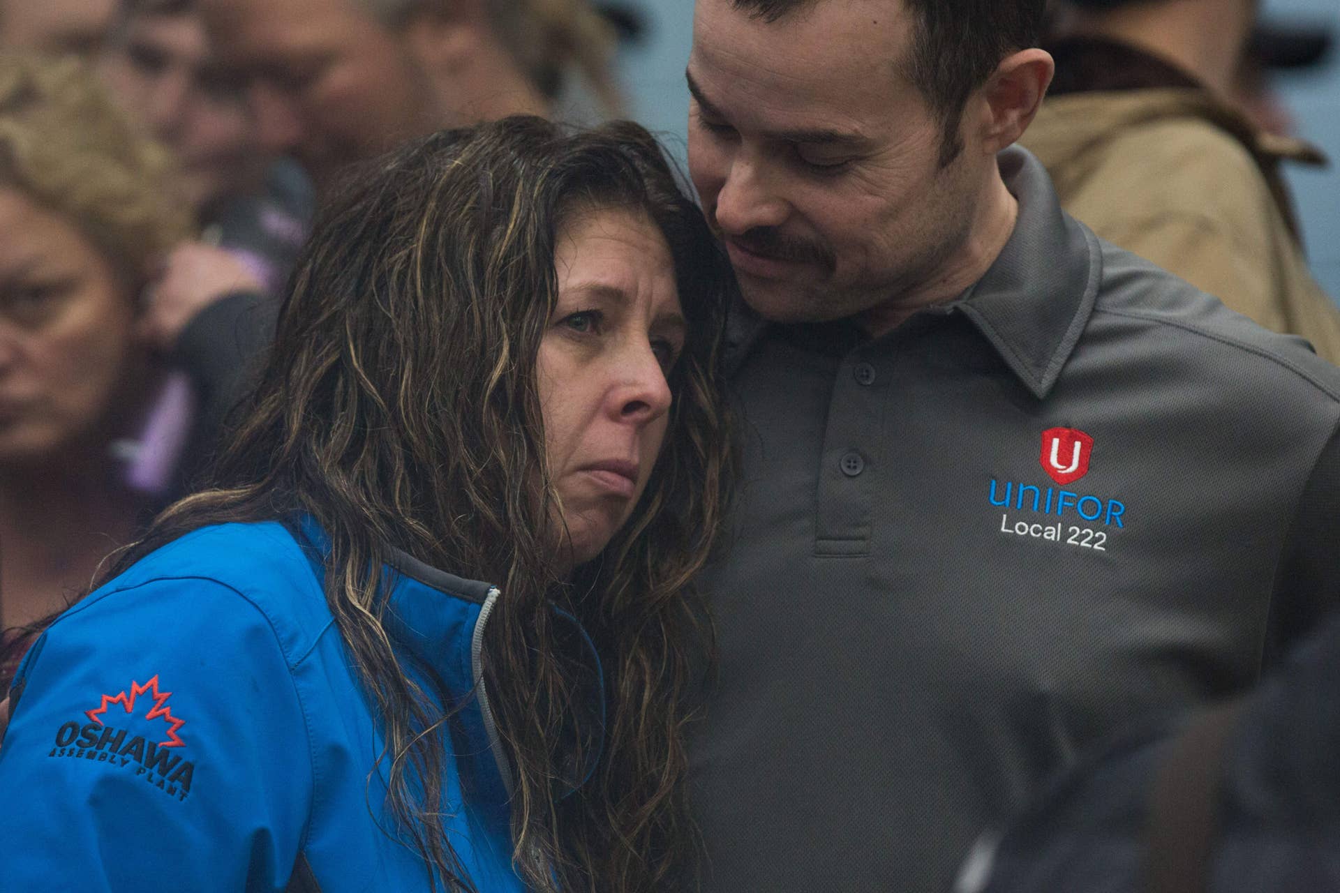 Members of Unifor local 222 gather at the union hall before the press conference with union leaders in Oshawa, Ontario, on November 26, 2018. - In a massive restructuring, US auto giant General Motors announced Monday it will cut 15 percent of its workforce to save $6 billion and adapt to 'changing market conditions.' The moves include shuttering seven plants worldwide as the company responds to changing customer preferences and focuses on popular trucks and SUVs and increasingly on electric models. GM will shutter three North American auto assembly plants next year: the Oshawa plant in Ontario, Canada; Hamtramck in Detroit, Michigan and Lordstown in Warren, Ohio. (Photo by Lars Hagberg / AFP) (Photo credit should read LARS HAGBERG/AFP/Getty Images)