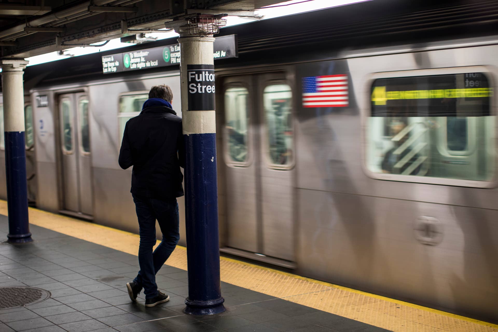 NEW YORK, NY - MARCH 22: A man waits for the train at the Fulton Center subway station, March 22, 2018 in New York City. According to a report by advocacy group TransitCenter, transit ridership declined in 31 of 35 major metropolitan cities in the U.S. in 2017. Factors in the decline include lower fuel costs, increased auto ownership and ride-sharing services like Lyft and Uber. (Photo by Drew Angerer/Getty Images)