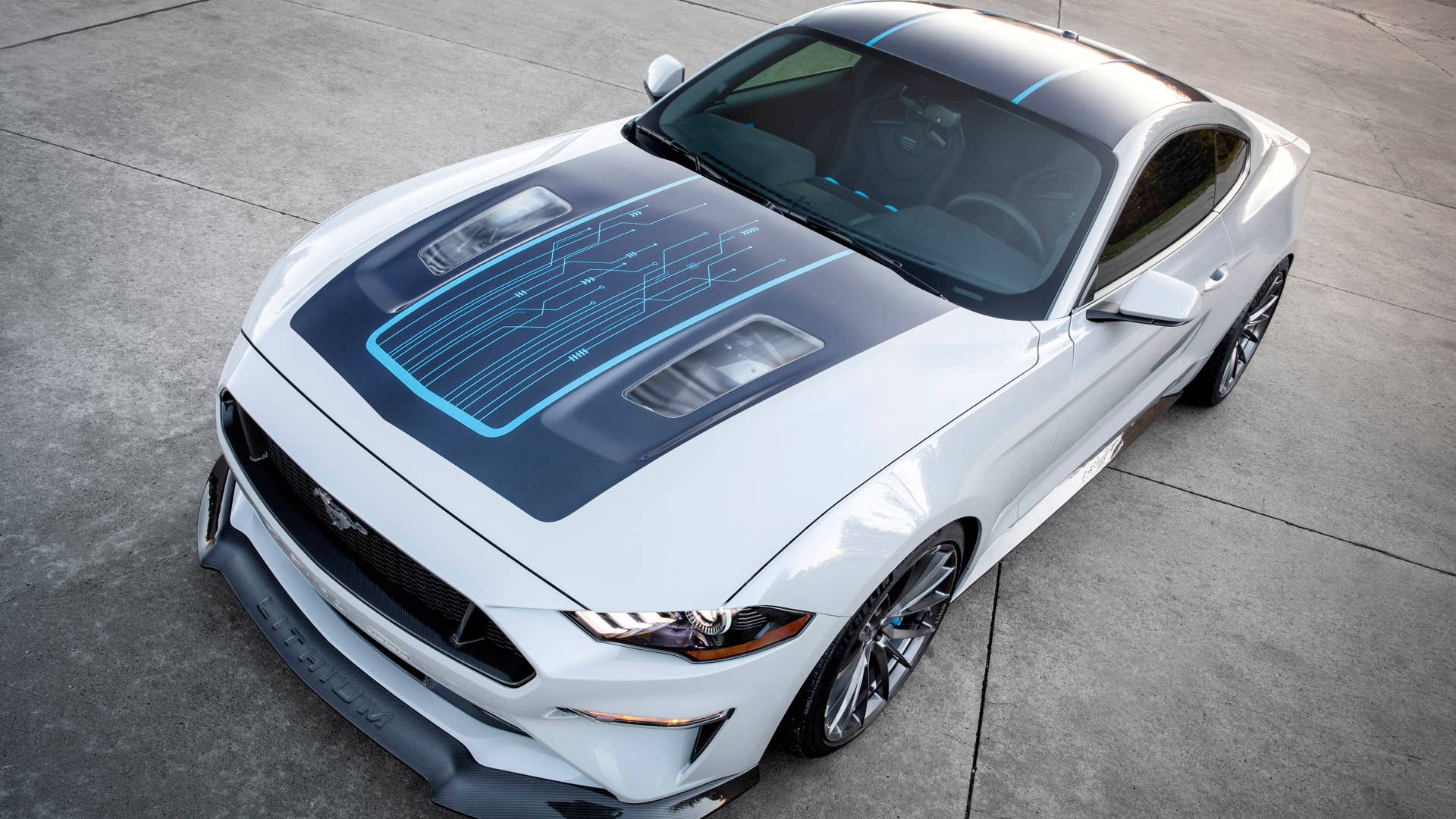 Ford and Webasto today reveal Mustang Lithium, an ultra-high-performance battery-electric Mustang fastback prototype. With more than 1,000 ft.-lbs. of torque and more than 900 horsepower instantaneously available, this Mustang amps muscle car performance to a new level and helps gauge the level of interest the next wave of performance customers have in lightning-quick performance that only fully electric powertrains can deliver.