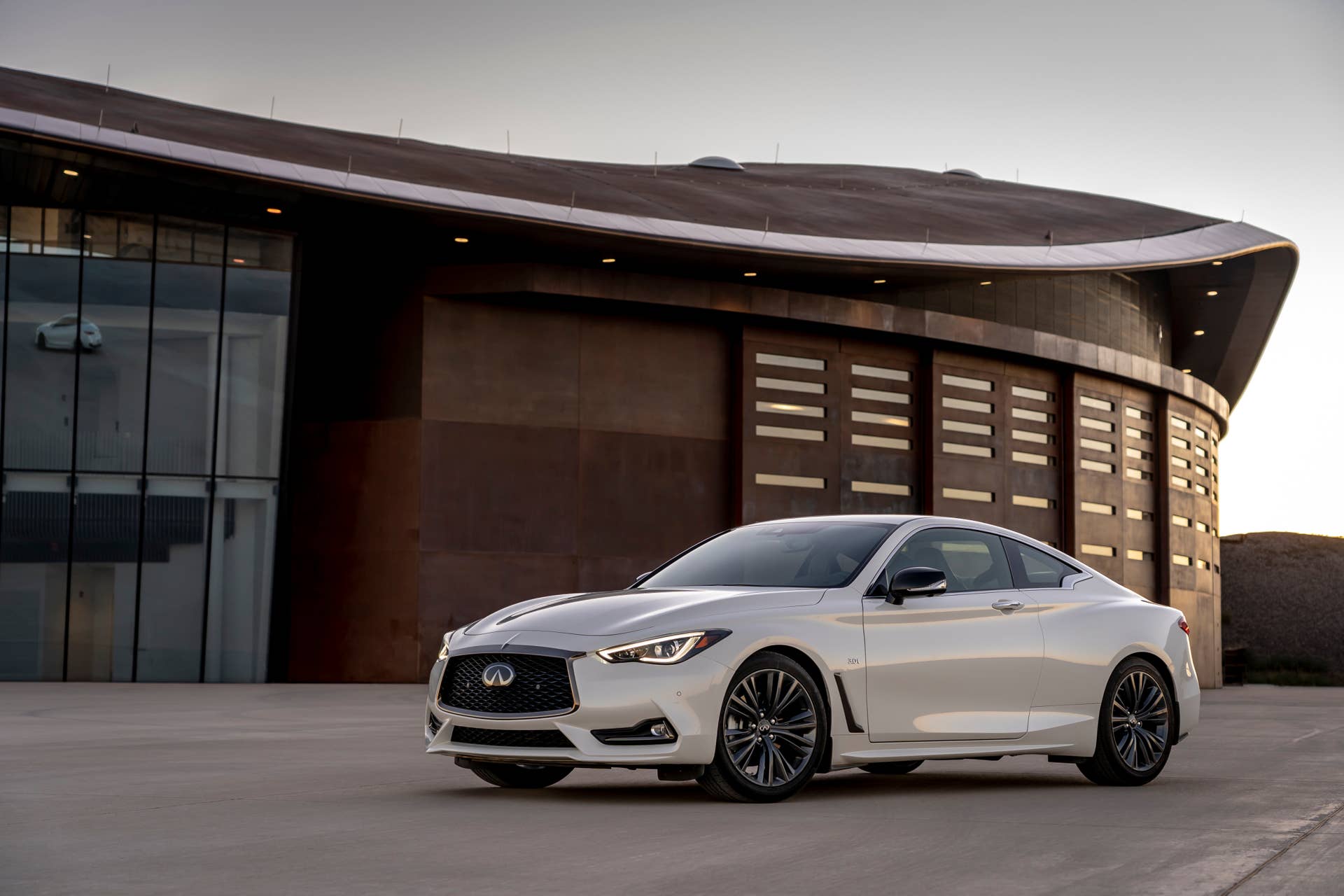 INFINITI EDITION 30 vehicles feature unique dark chrome exterior grille surround, fender trim and rear finisher in addition to black side-view mirrors, dark-finish wheels and body color rear apron.