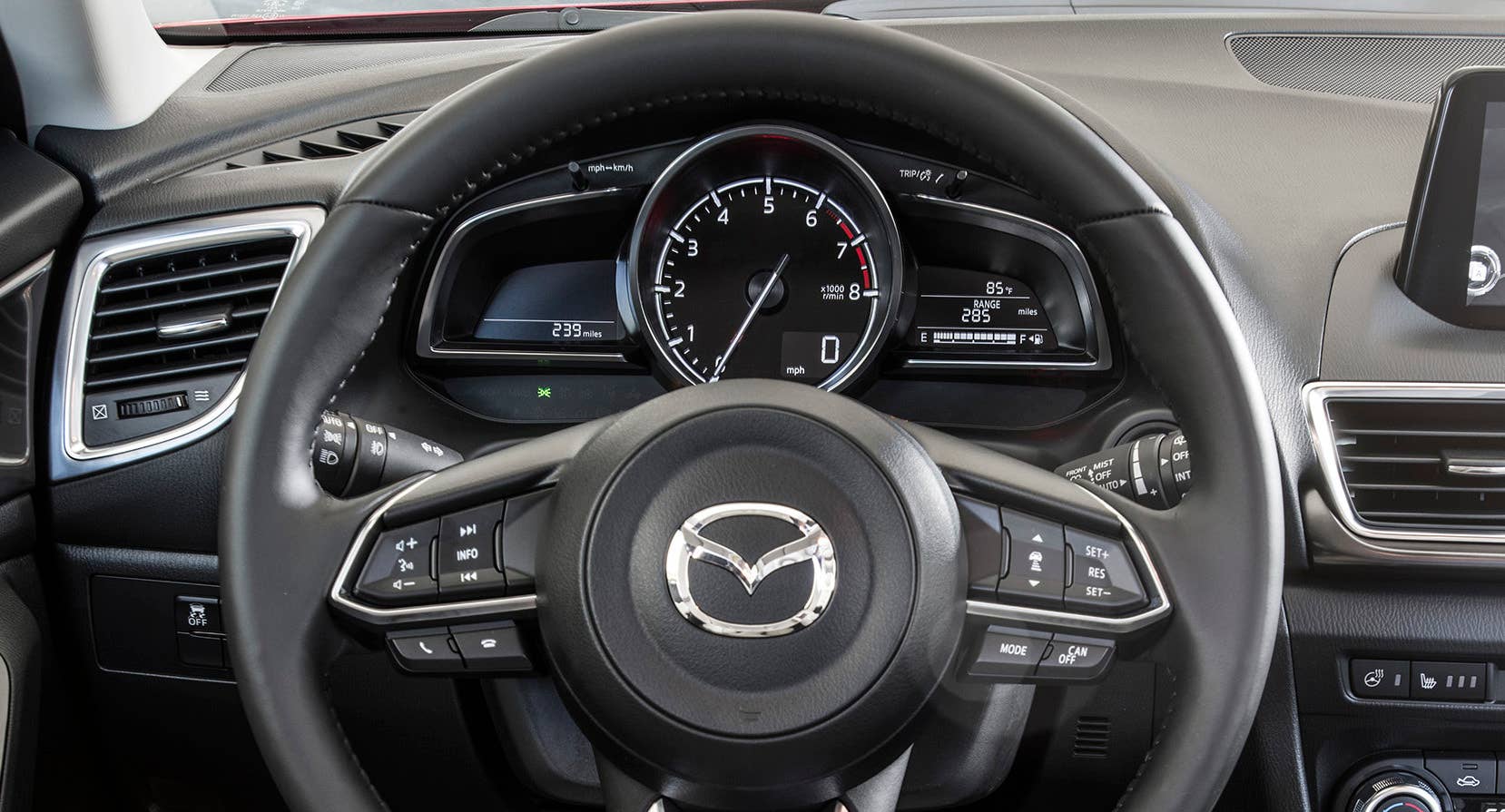 The current Mazda3 gauge cluster.