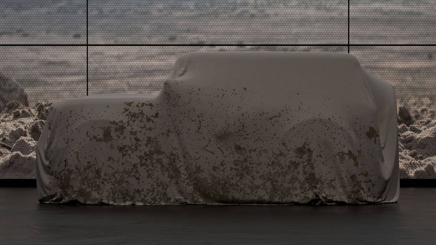 Under the sheet is the upcoming Ford Bronco