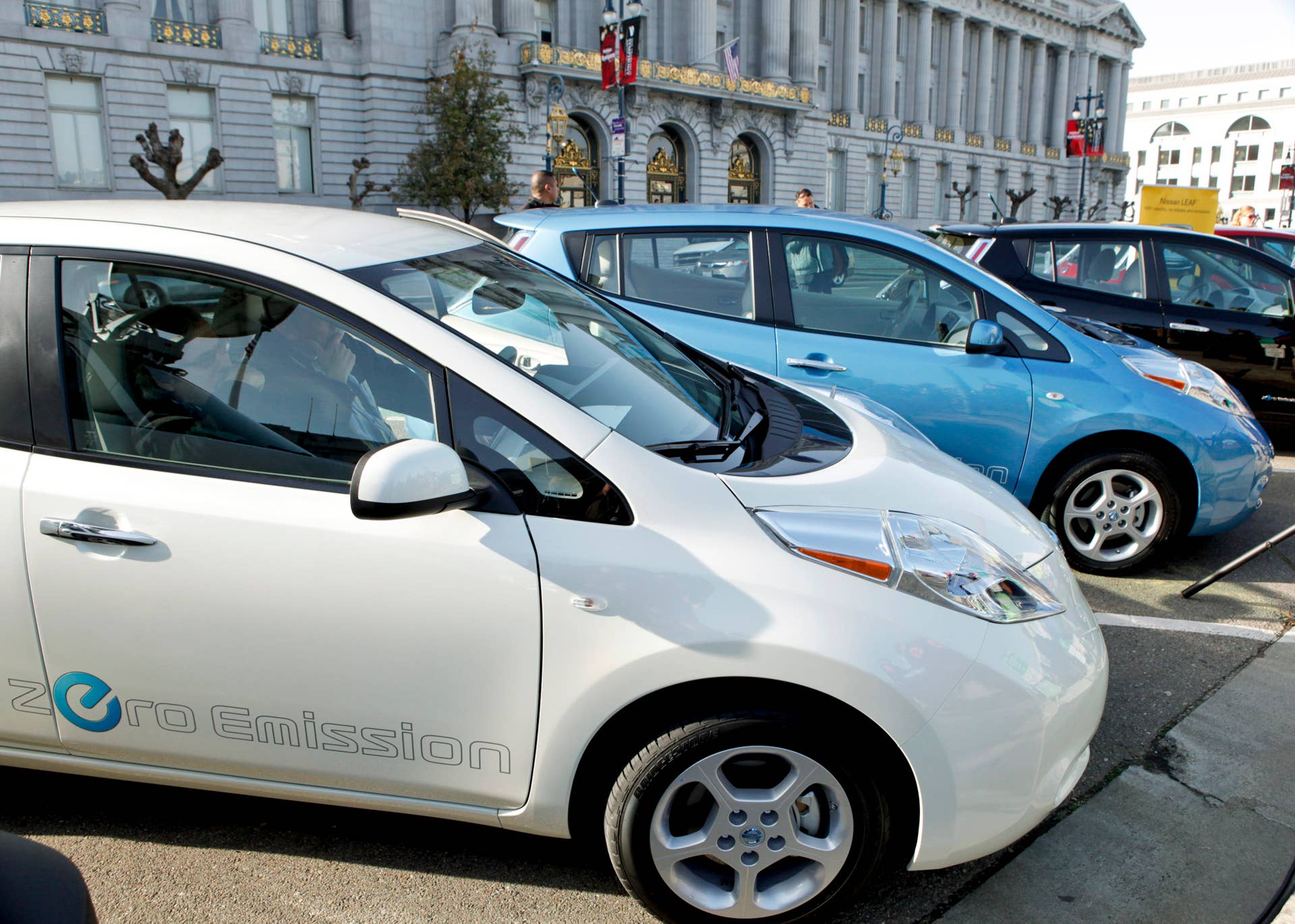 Nissan Motor Co. Leaf electric cars are parked on display during a news conference at City Hall in San Francisco, California, U.S. on Saturday, Dec. 11, 2010. Nissan, which wants to be the world's biggest seller of electric autos, delivered the first Leaf to Olivier Chalouhi at a dealership in Petaluma, California. Photographer: Ryan Anson/Bloomberg via Getty Images