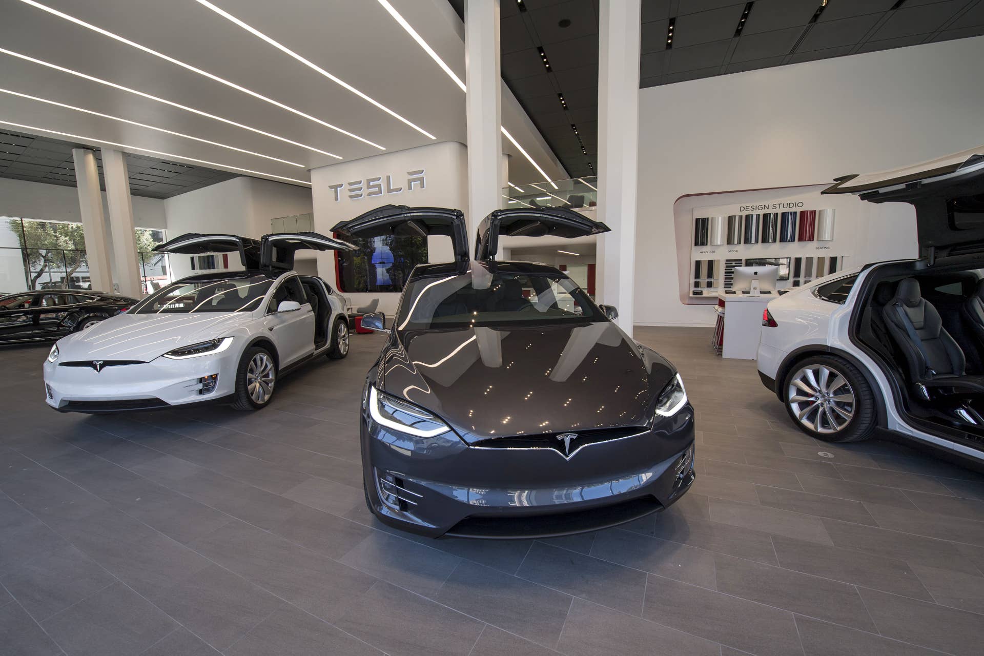 Tesla Motors Inc. Model X vehicles are displayed at the company's new showroom in San Francisco, California, U.S., on Wednesday, Aug. 10, 2016. Tesla Motors Inc. marked the opening of its largest North American sales, service and delivery center in San Francisco, a key market from which Elon Musk's electric-car maker will introduce its all-important Model 3 sedan late next year. Photographer: David Paul Morris/Bloomberg via Getty Images