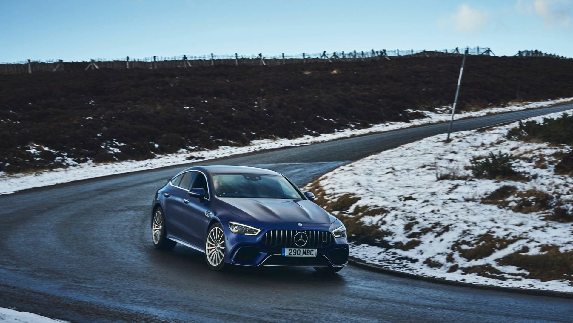 2020 Mercedes-AMG GT 63 S Sedan front corner turn road blue snow