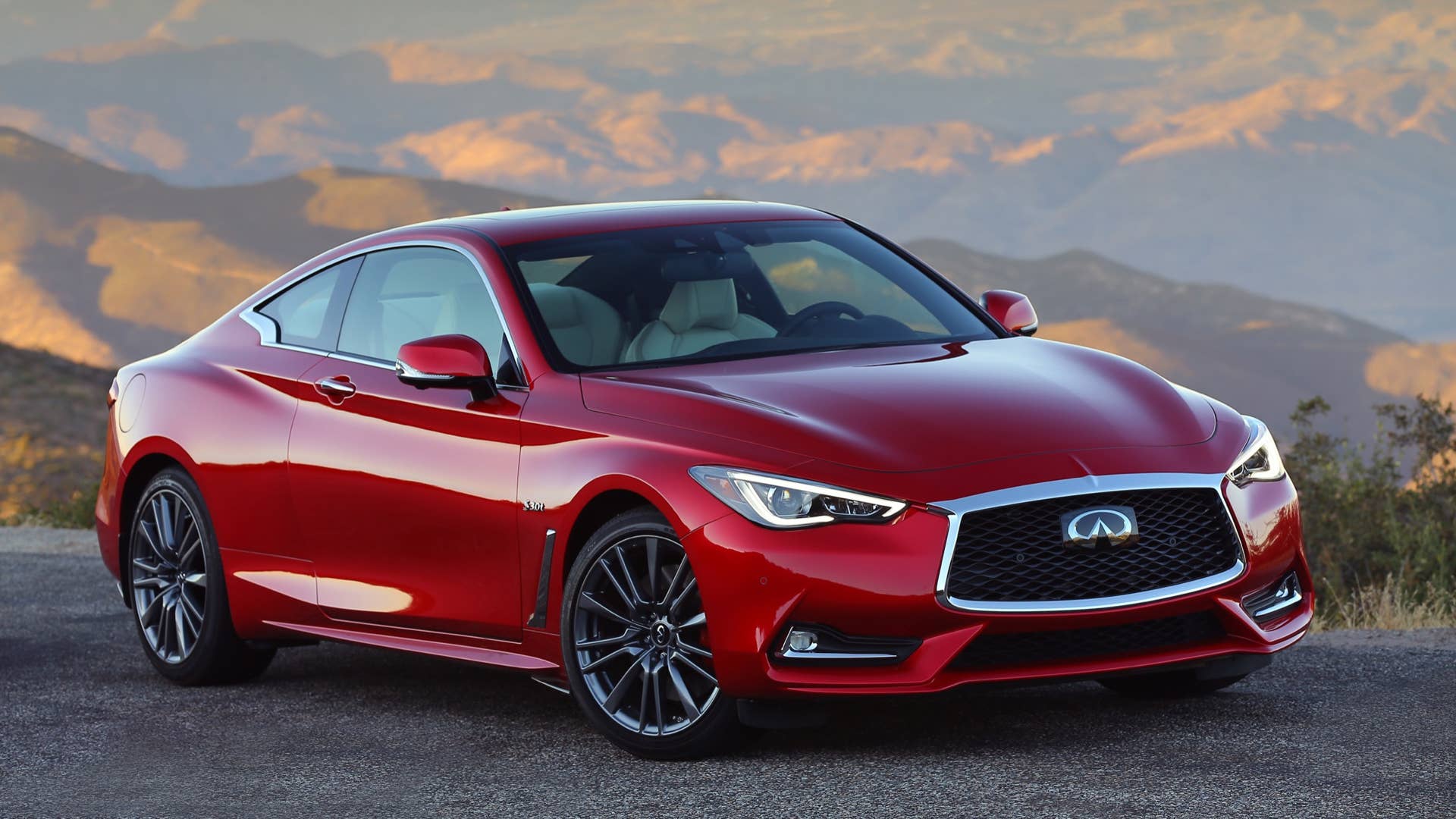 The Q60 brings INFINITIâs powerful design language into the sports coupe segment with remarkable success, with its daring curves, deep creases, and flowing lines intensifying its low, wide, powerful stance. The look is progressive and modern, yet dynamic and moving.
