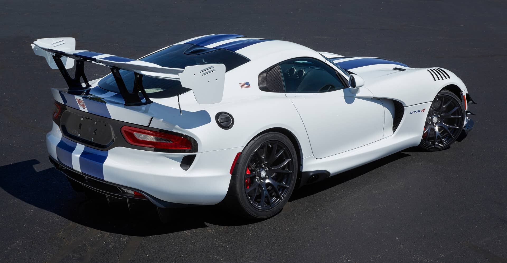 2017 Dodge Viper GTS-R Commemorative Edition ACR (American Club Racer) is designed to pay tribute to one of the most distinguishable and iconic Viper paint schemes of all time â the white and blue combination of the 1998 Viper GTS-R GT2 Championship Edition. This special edition model features Pearl White exterior with Blue Pearl GTS stripes, Extreme Aero Package, Carbon Ceramic brakes, Exterior Carbon Package, unique red Stryker badge decal, GTS-R exterior sill decals, USA flag B-pillar decals, ACR interior with red accent stitching, Header Red seat belts, serialized instrument panel GTS-R badge and a custom car cover that matches the exterior paint scheme and showcases the customer name above the driverâs side door. As many as 100 units of this new special edition configuration will be built for the 2017 model year.