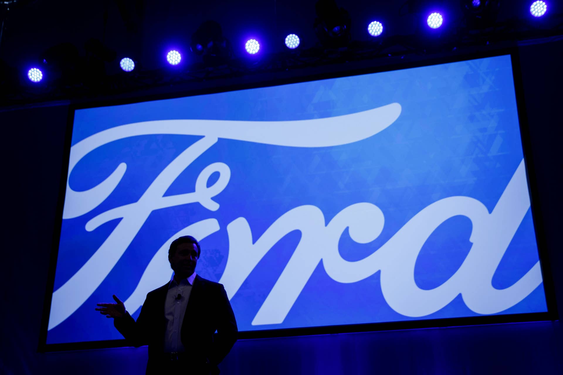 Mark Fields, president and chief executive officer of Ford Motor Co., speaks during Automobility LA ahead of the Los Angeles Auto Show in Los Angeles, California, U.S., on Tuesday, November 15, 2016. President-elect Donald J. Trump's proposal to levy a 35 percent tariff on cars made in Mexico would hurt the U.S. economy, according to Fields -- the target of the future president's tariff talk. Photographer: Patrick T. Fallon/Bloomberg via Getty Images