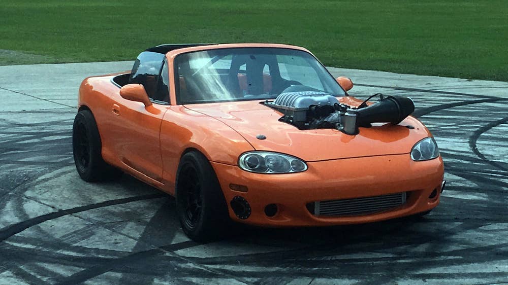 Orange Miata with a Hellcat engine