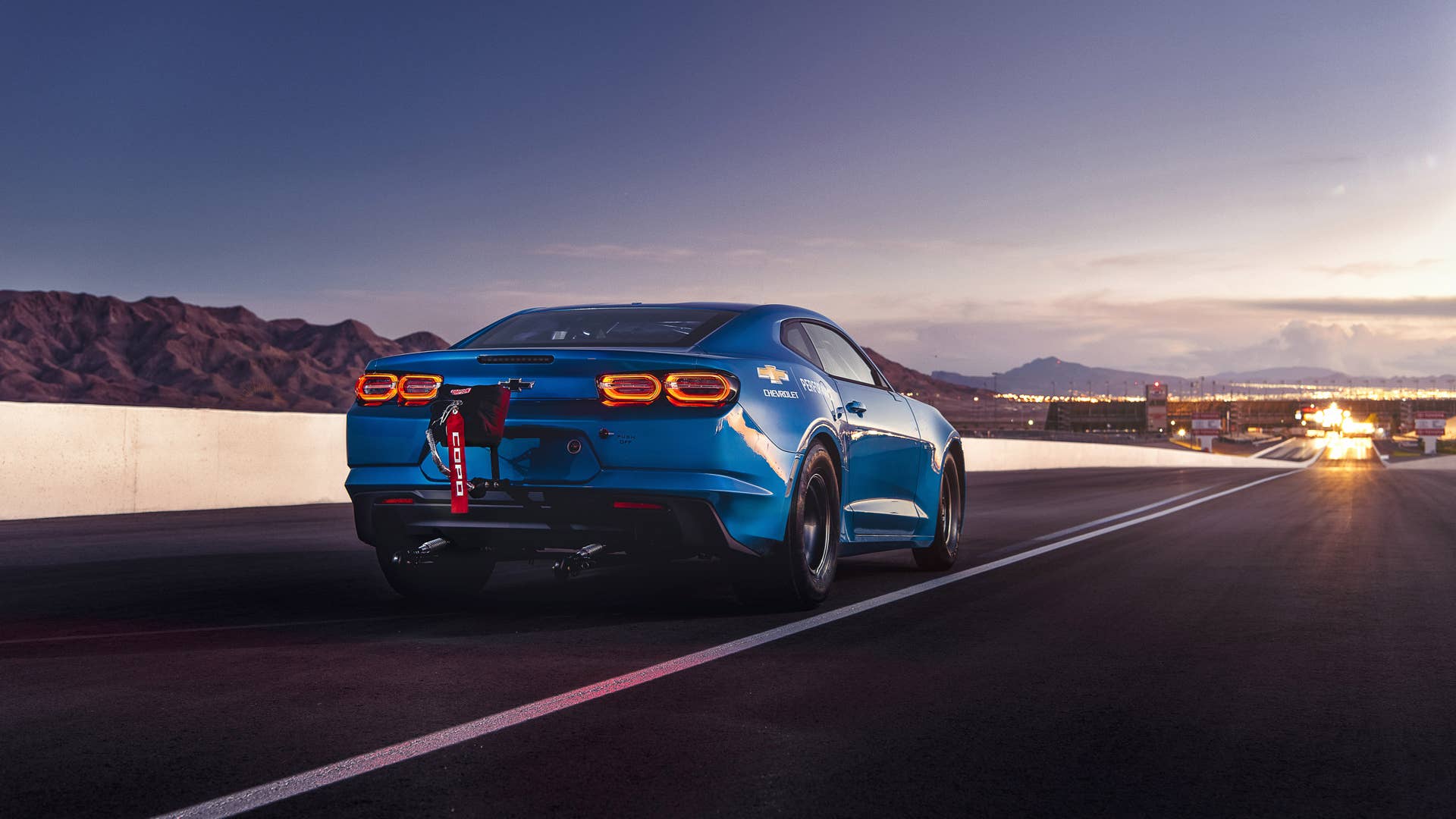 The eCOPO Camaro Concept offers an electrified vision of drag racing, with an electric motor and GM’s first 800-volt battery pack replacing the gas engine, enabling 9-second quarter-mile times.