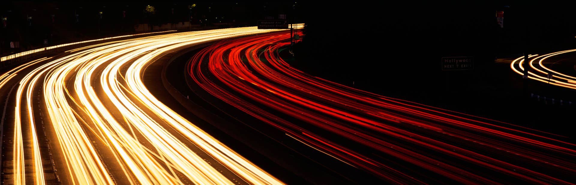This is the Hollywood Freeway at night, There are the streaked lights from cars on the freeway. (Photo by Visions of America/UIG via Getty Images)