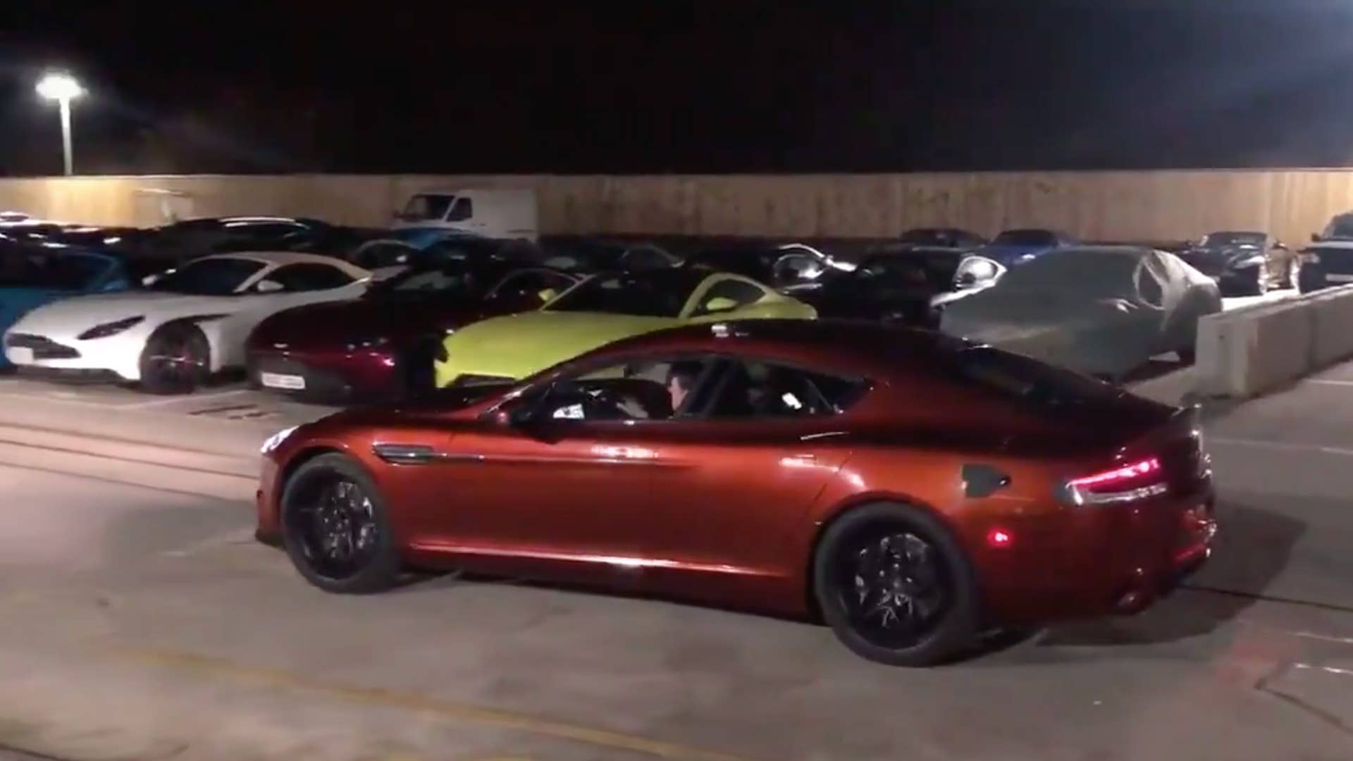 CEO Andy Palmer tweeted a video fo the Rapide E prototype driving in the parking lot.
