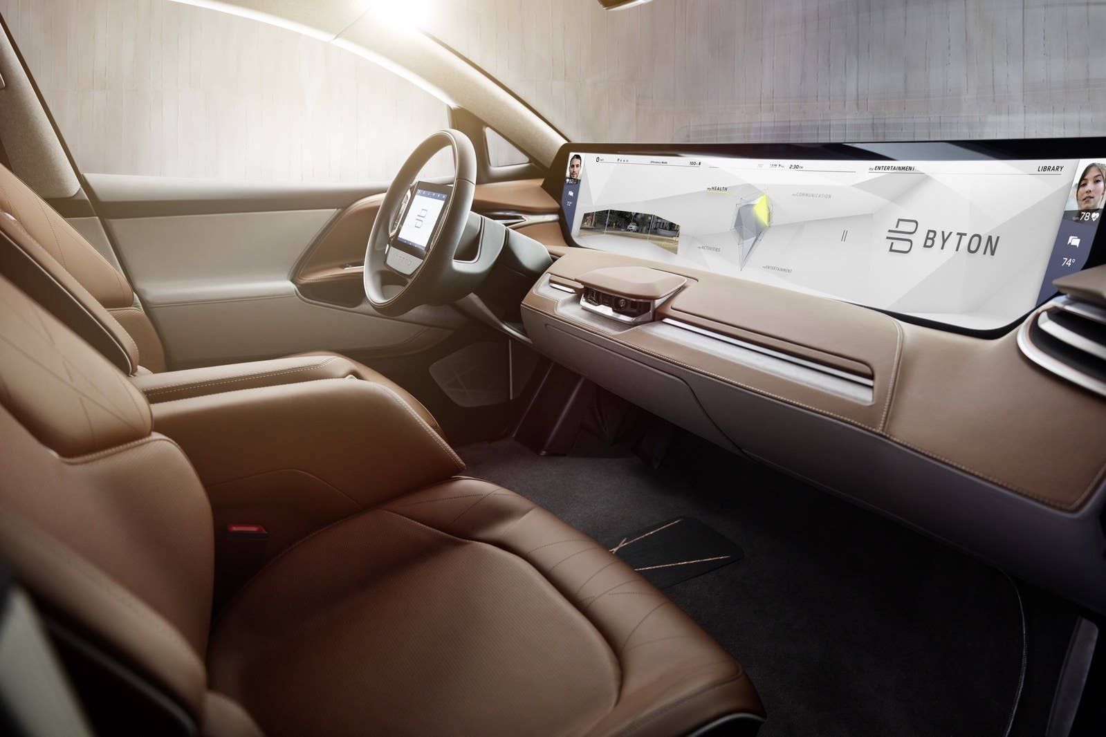 BYTON's Shared Experience Display includes sensors that enable front and rear passengers to control the screen using hand gestures. (PRNewsfoto/BYTON)