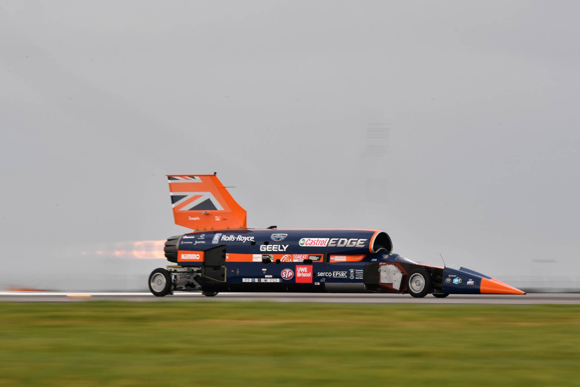 The Bloodhound supersonic car, driven by Andy Green, Royal Air Force Wing Commander, makes a test run at the airport in Newquay on October 26, 2017. The Bloodhound SSC will be conducting its first high-speed trials today with the aim of breaking the world land speed record in South Africa in 2019. / AFP PHOTO / Ben STANSALL (Photo credit should read BEN STANSALL/AFP/Getty Images)