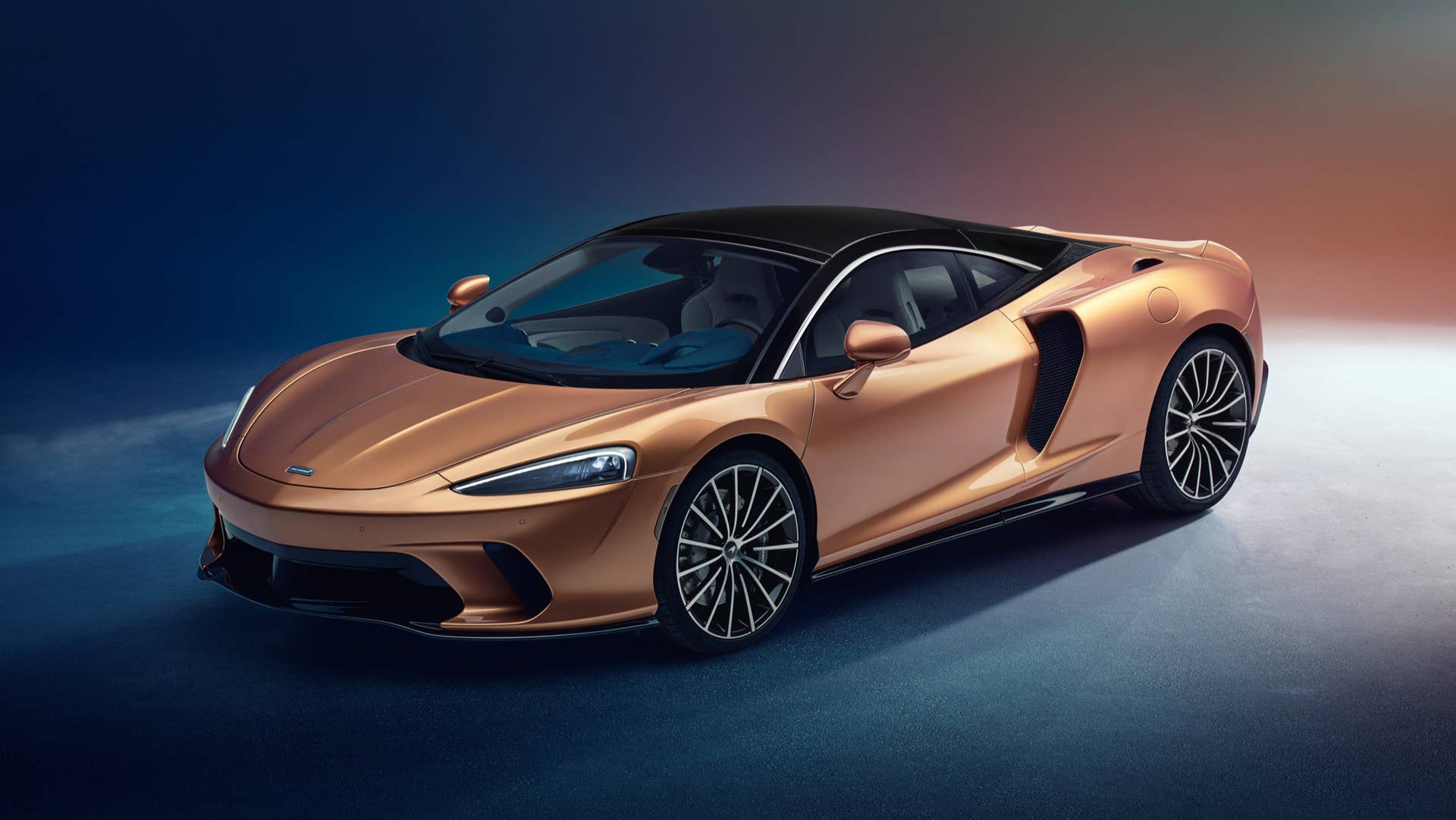 McLaren Superlight Grand Tourer gold front three-quarters