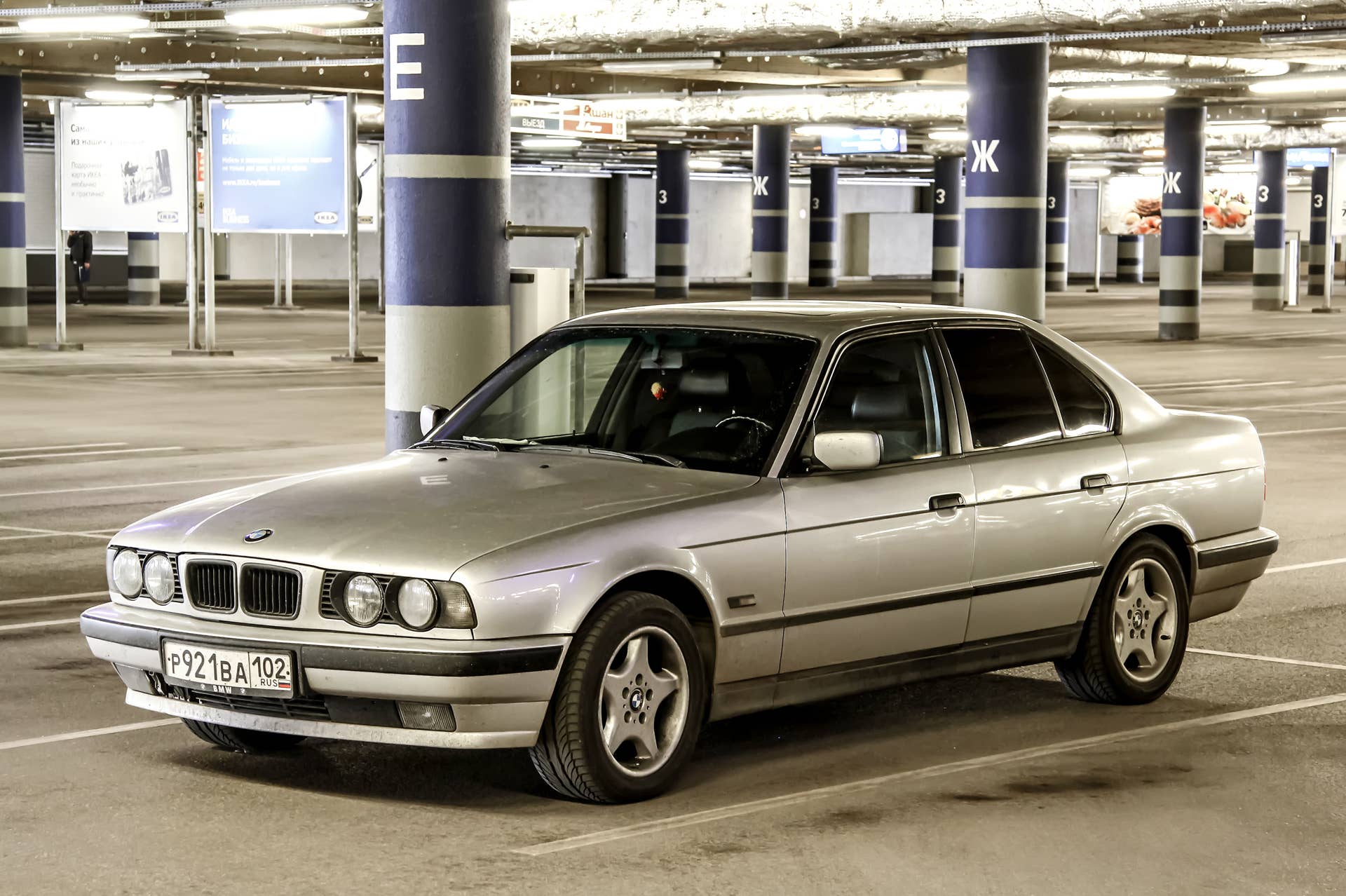 Ufa, Russia - August 27, 2014: Motor car BMW E34 5-series is parked in the underground parking.