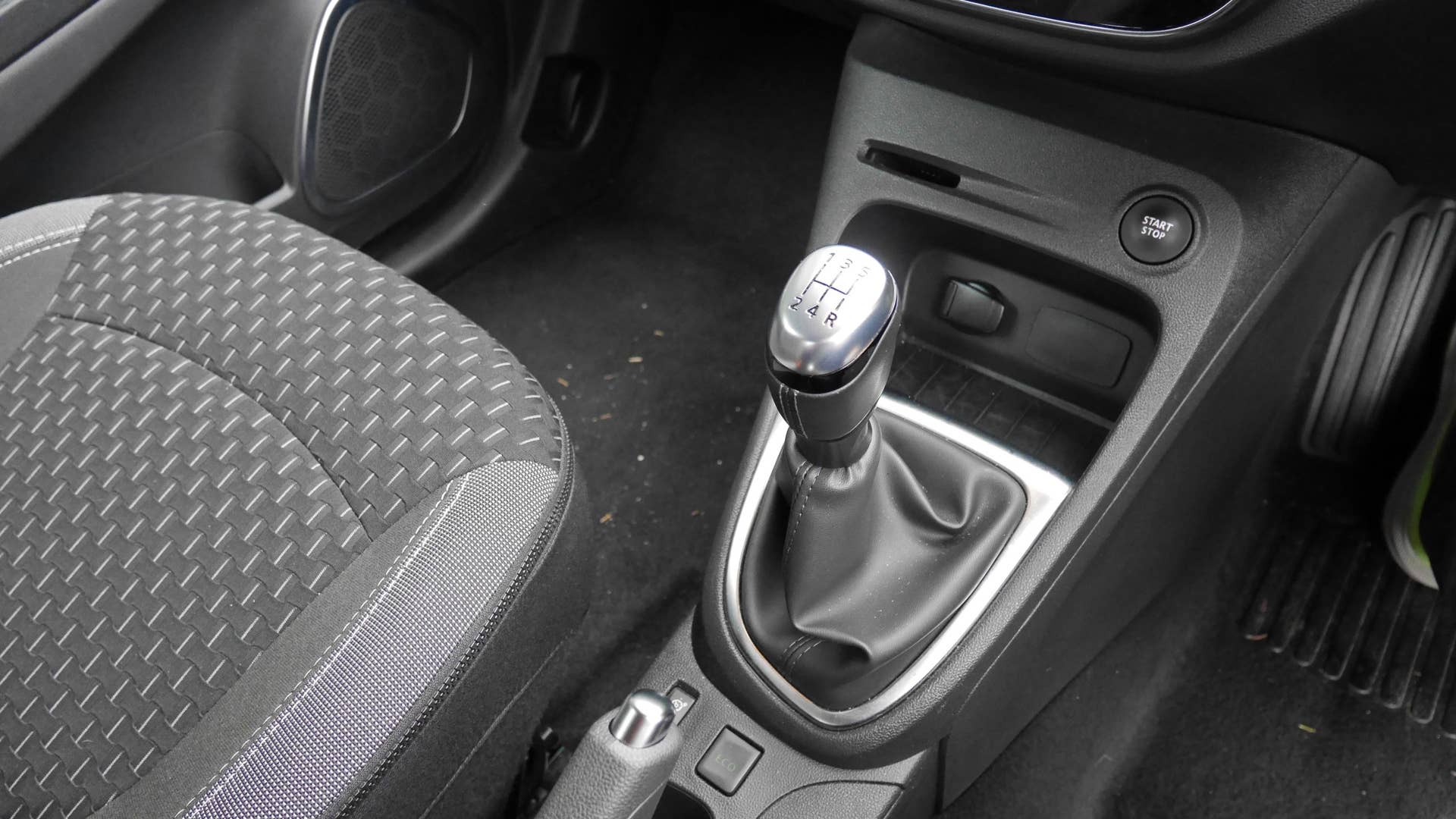 Why yes, that is a manual transmission in a subcompact SUV. And yes, you do shift it with your left hand.