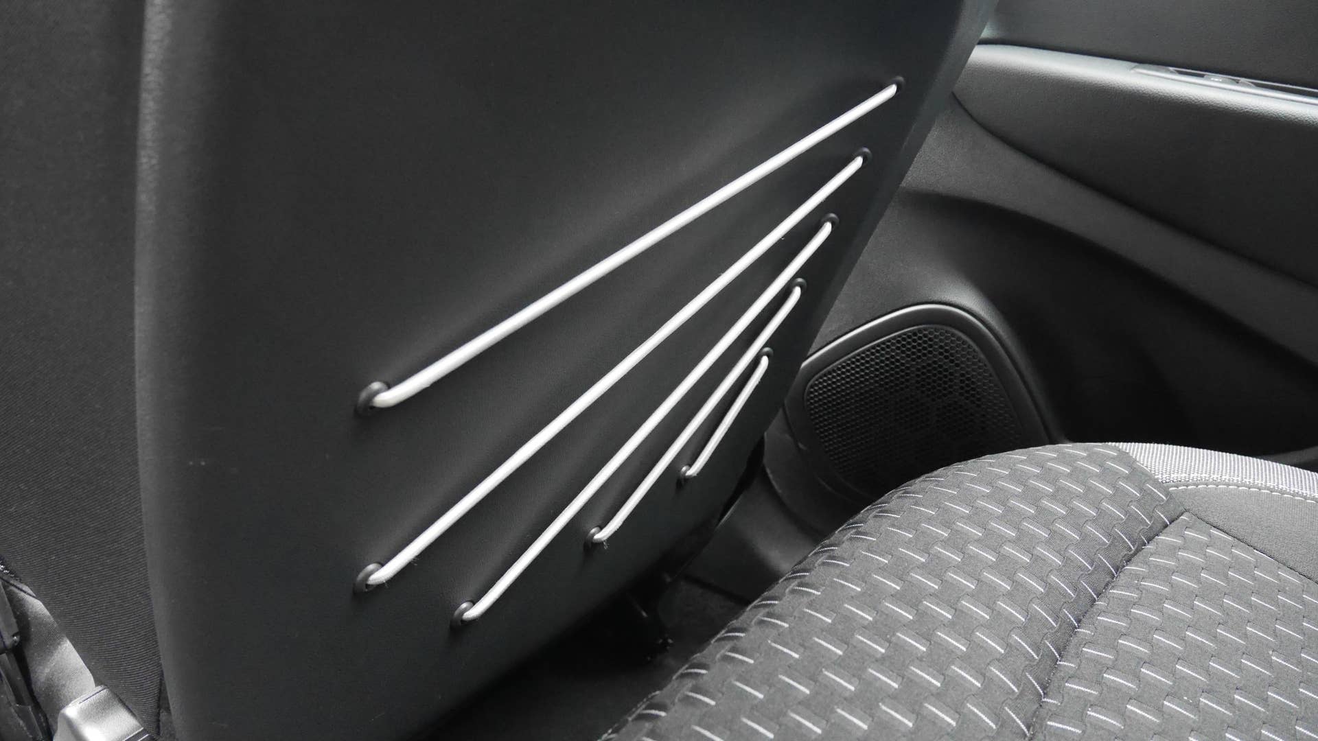 Seat back pockets? Ha! We'll give you bungie chords.
