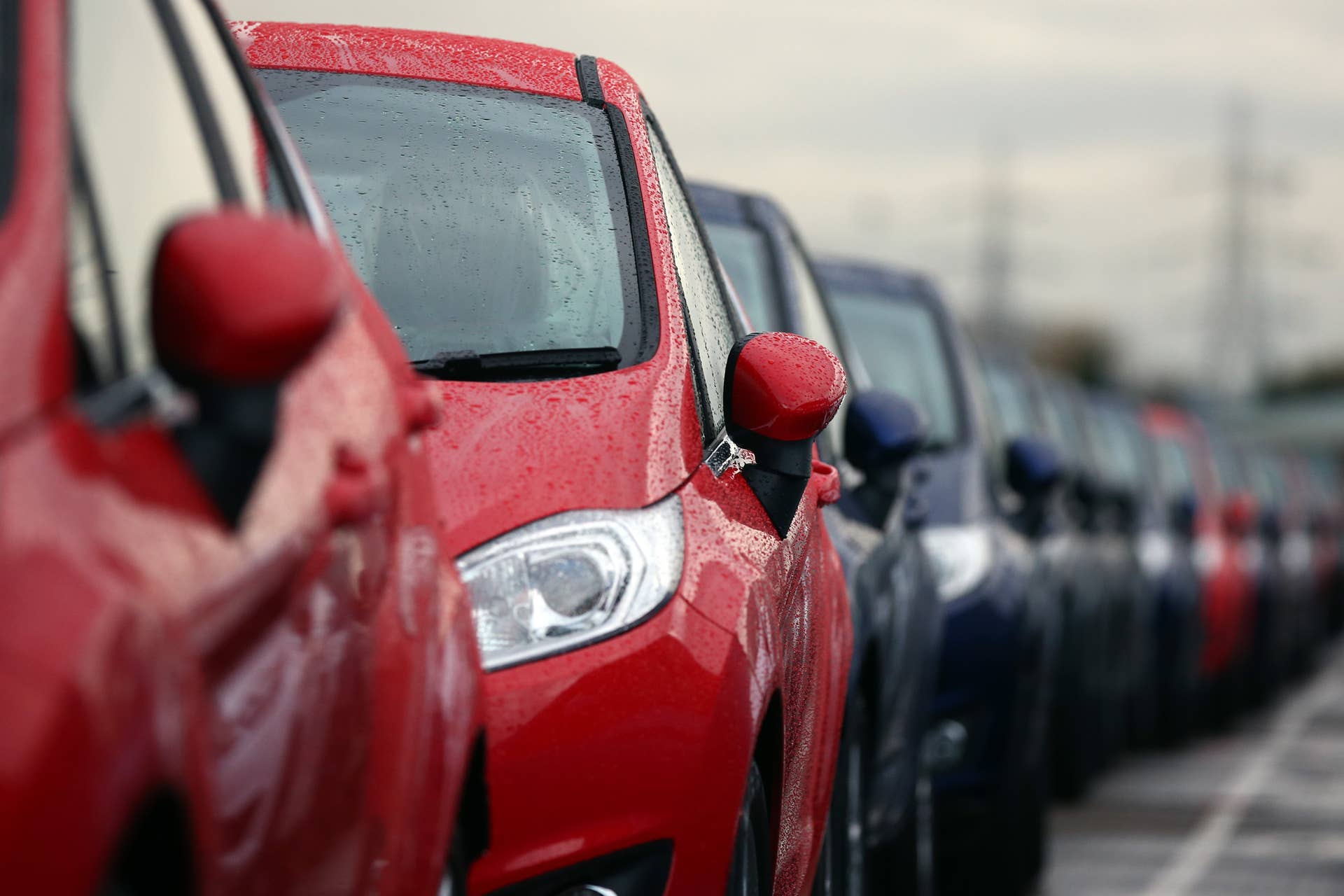 DAGENHAM, ENGLAND - JANUARY 13: Cars are prepared for distribution at a Ford factory on January 13, 2015 in Dagenham, England. Originally opened in 1931, the Ford factory has unveiled a state of the art GBP475 million production line that will start manufacturing the new low-emission, Ford diesel engines from this November this will generate more than 300 new jobs, Ford currently employs around 3000 at the plant in Dagenham. (Photo by Carl Court/Getty Images)
