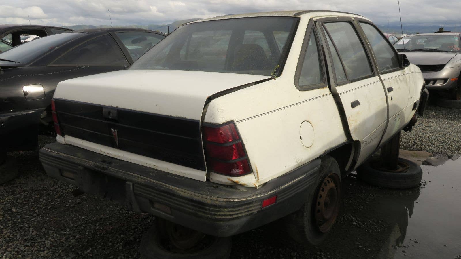 1988 Pontiac LeMans in California wrecking yard