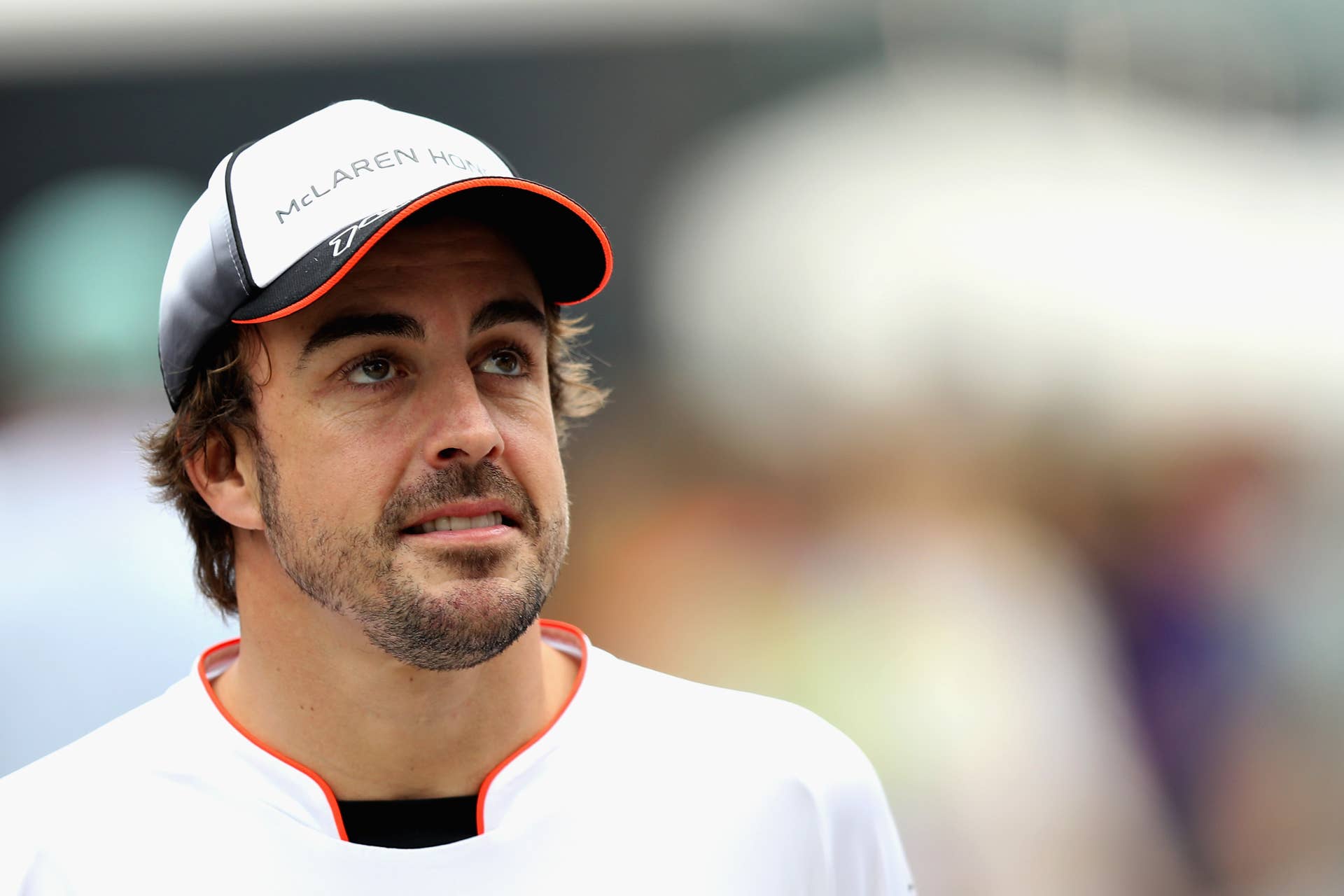 SAO PAULO, BRAZIL - NOVEMBER 11: Fernando Alonso of Spain and McLaren Honda walks in the Paddock during practice for the Formula One Grand Prix of Brazil at Autodromo Jose Carlos Pace on November 11, 2016 in Sao Paulo, Brazil. (Photo by Mark Thompson/Getty Images)