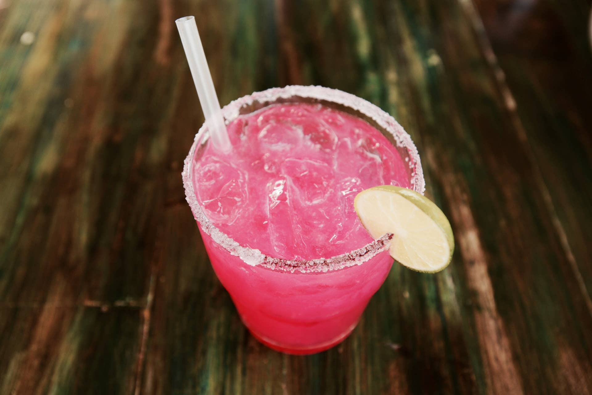 This is a pomegranate margarita made in Mexico with love. This drink is a photo worthy concoction, colours, pink, fruity, sweet, salty, lime, all make up this drink and beverage. Glass is rimmed with salt for extra flavour and zest as you drink this beautiful and refreshing icy and ice filled drink.