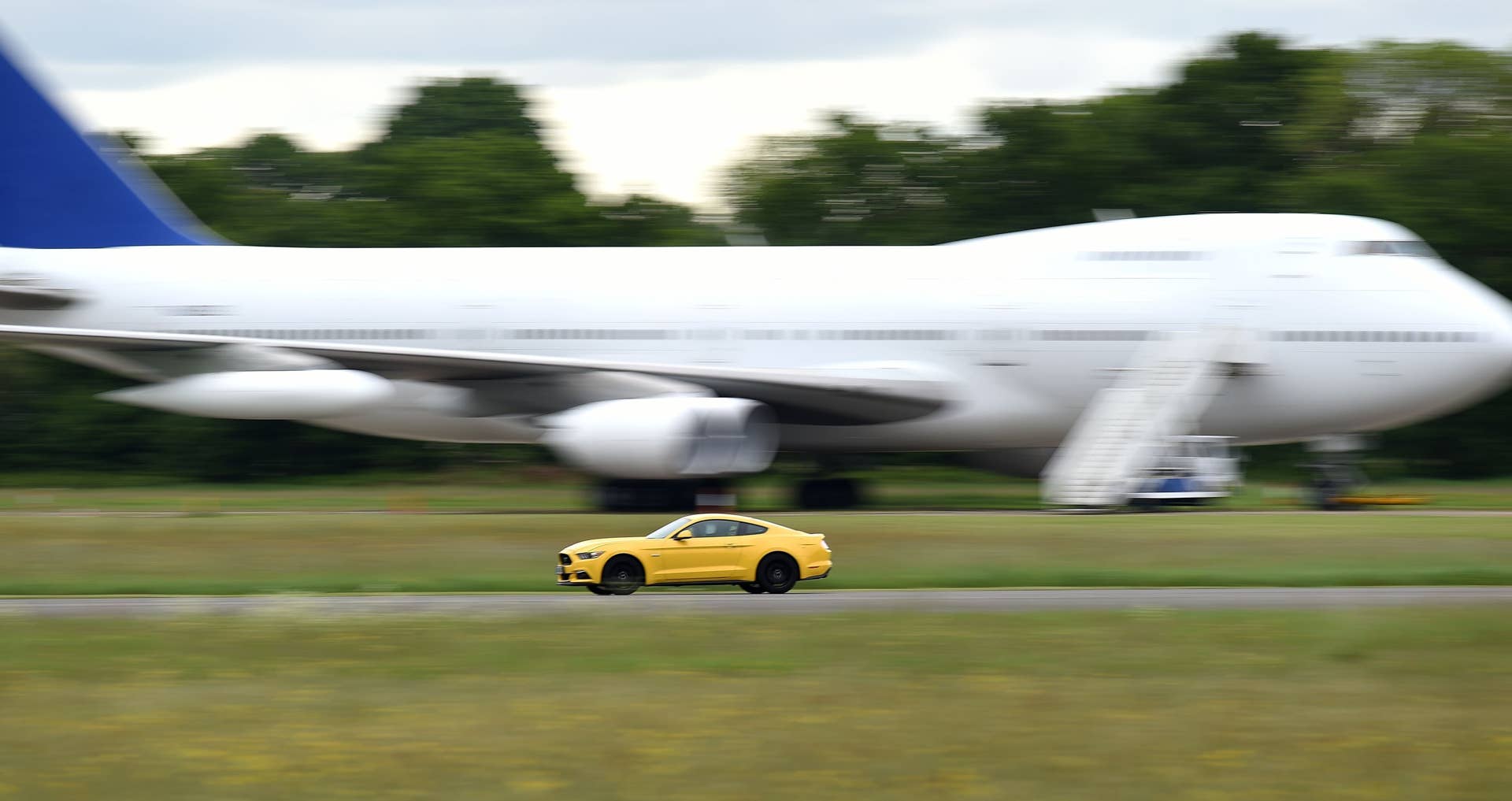 Press Association reporter Kerri-Ann Roper in the passenger seat of a Mustang, during a lap round the Top gear track with Sabine Schmitz during the Top Gear launch at Dunsfold Aerodrome in Surrey.