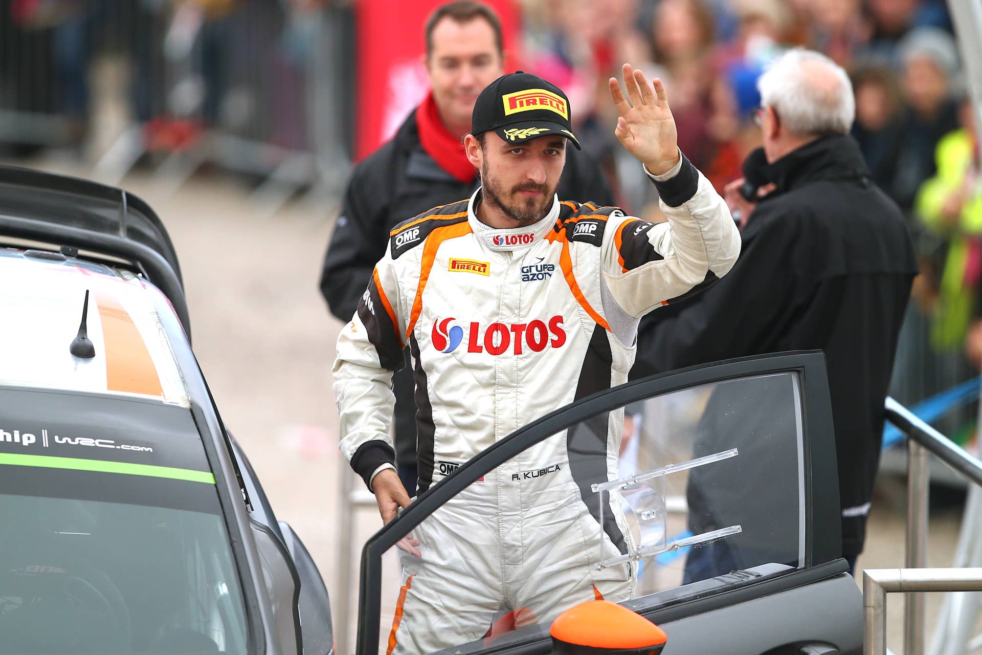DEESIDE, WALES - NOVEMBER 15: Robert Kubica of Poland waves to the crowd during the finishing ceremony of the FIA World Rally Championship Great Britain on November 15, 2015 in Deeside, Wales. (Photo by Clive Rose/Getty Images)