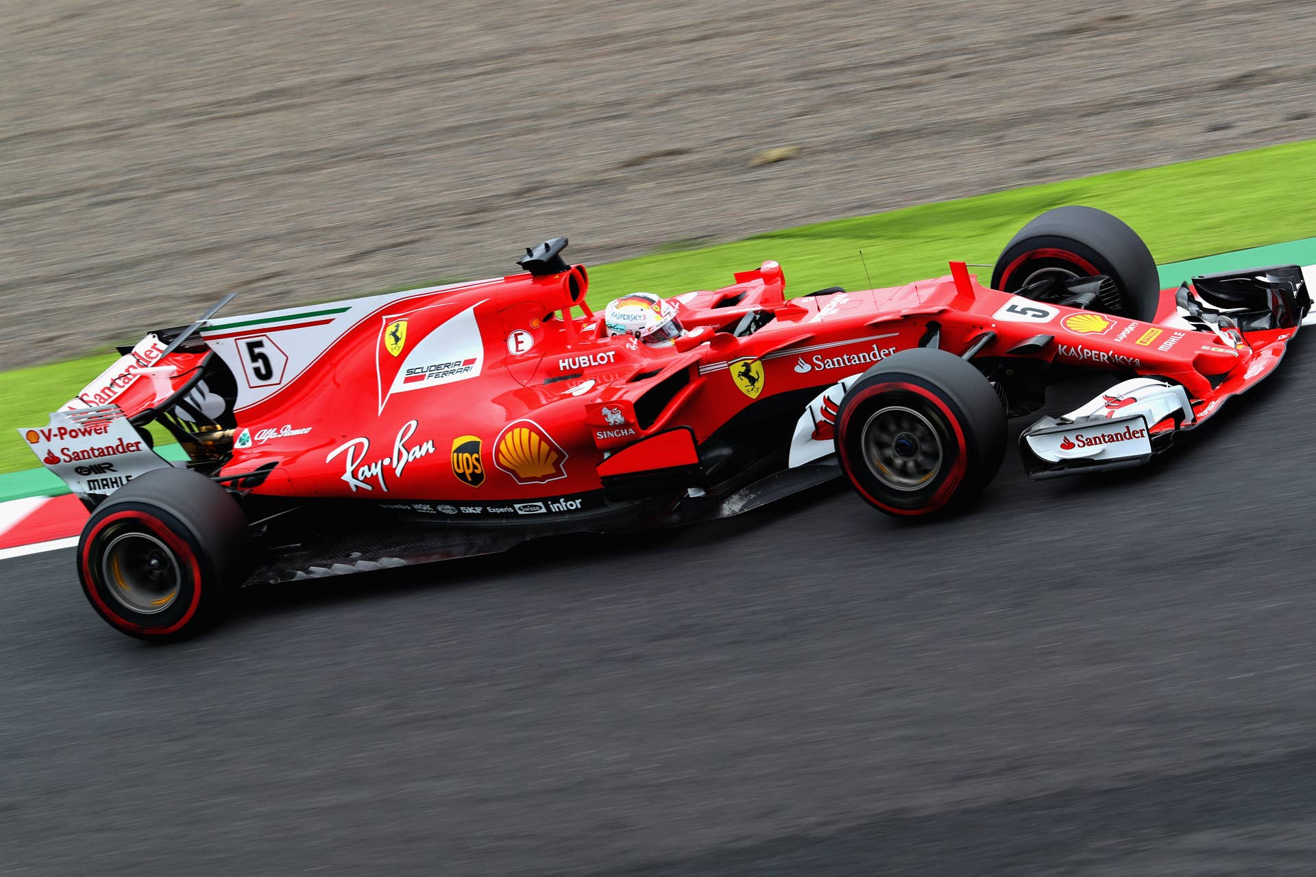 SUZUKA, JAPAN - OCTOBER 07: Sebastian Vettel of Germany driving the (5) Scuderia Ferrari SF70H on track during final practice for the Formula One Grand Prix of Japan at Suzuka Circuit on October 7, 2017 in Suzuka. (Photo by Mark Thompson/Getty Images)