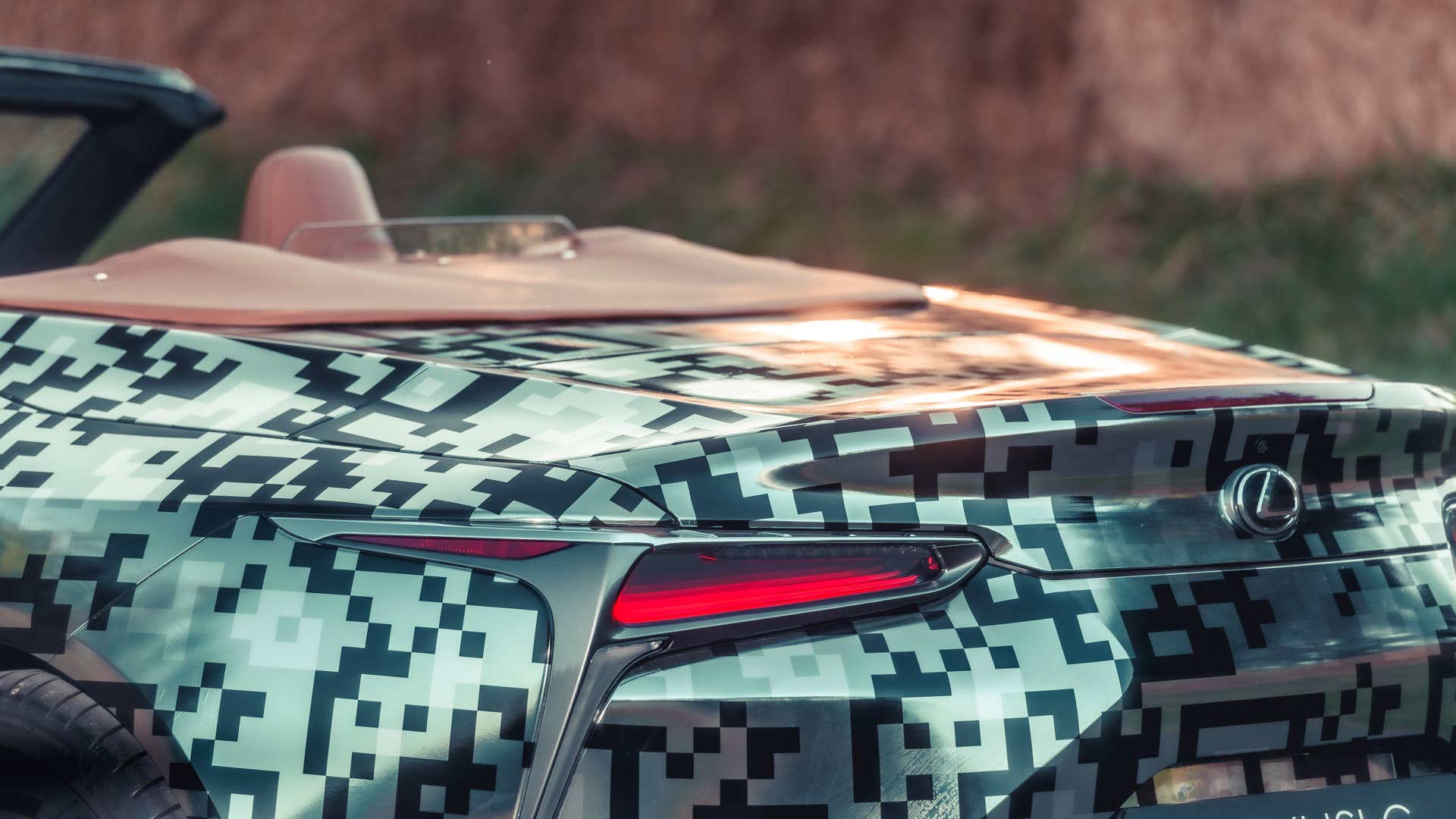 Lexus LC Convertible prototype in silver camouflage