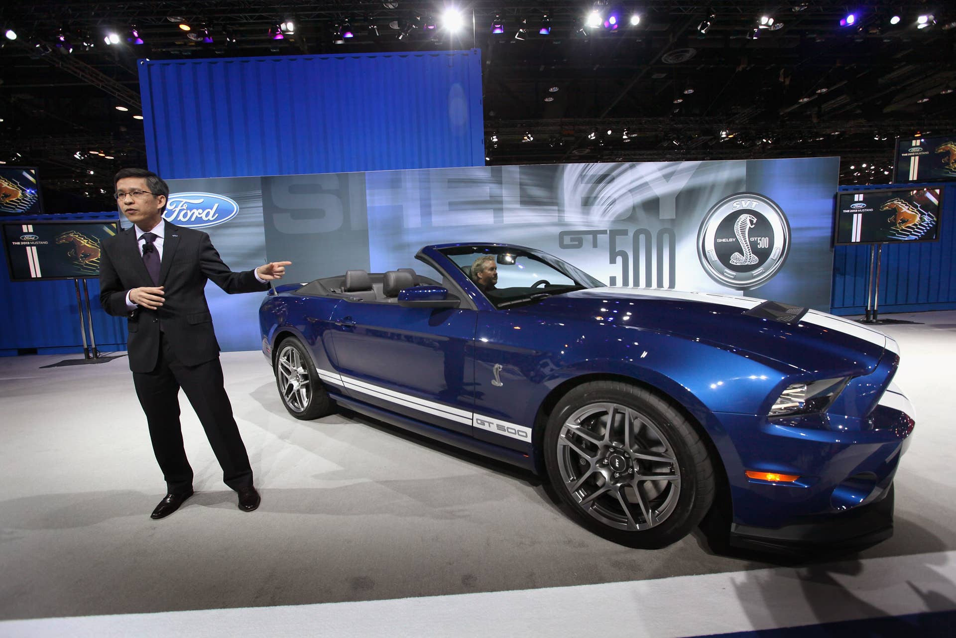 CHICAGO, IL - FEBRUARY 08: Hau Thai-Tang, executive director of global product programs at Ford, introduces the Ford Mustang GT500 Shelby convertible during the media preview of the Chicago Auto Show at McCormick Place on February 8, 2012 in Chicago, Illinois. The show, which is the largest and oldest auto show in the country, opens to the public on February 10. (Photo by Scott Olson/Getty Images)