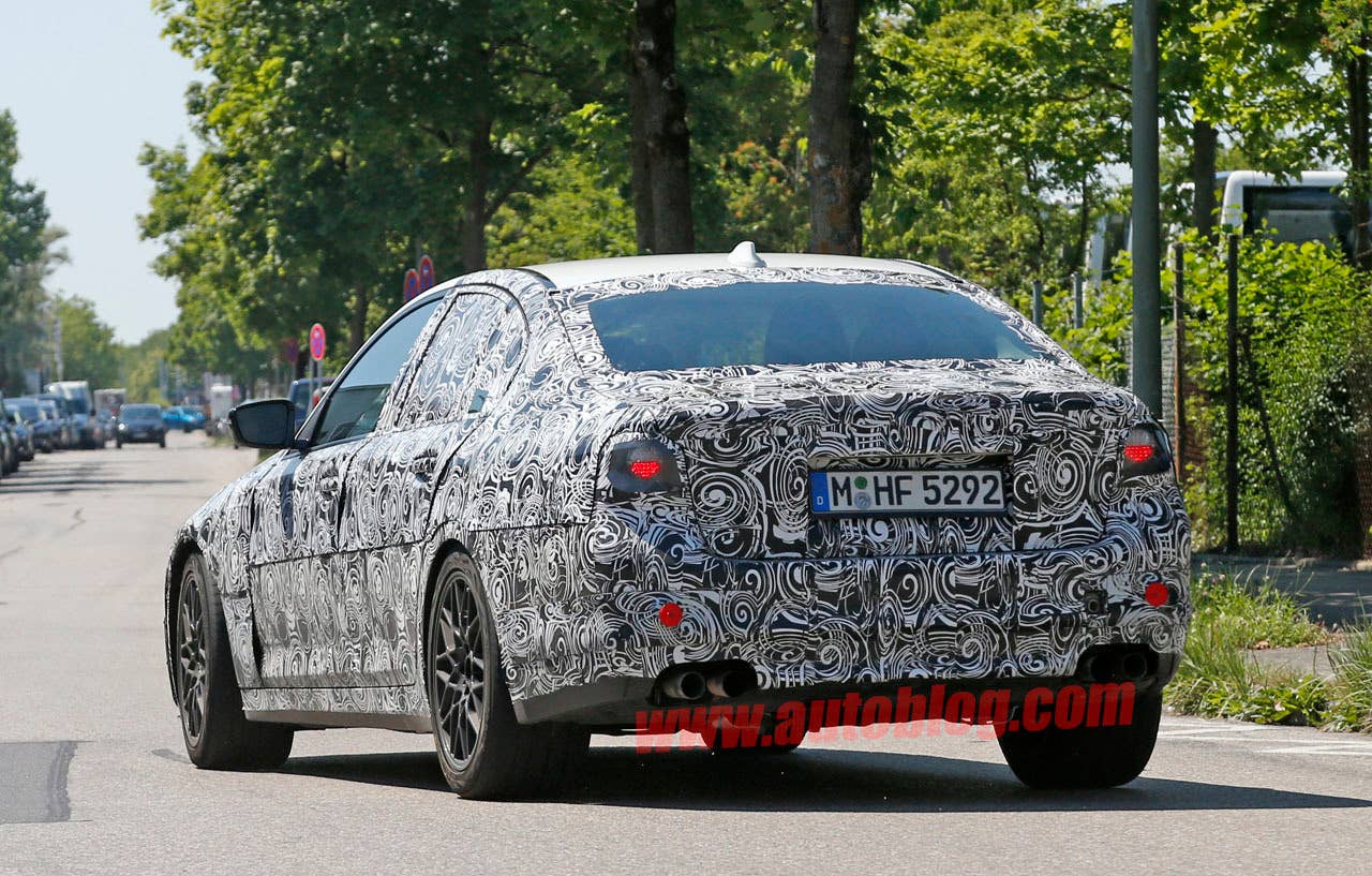 camouflaged bmw m5 spy shots taillights
