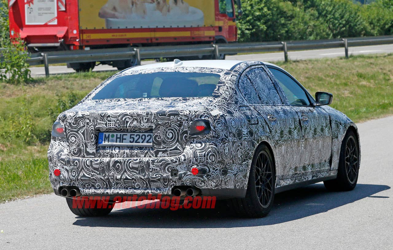 camouflaged bmw m5 spy shots quad exhaust