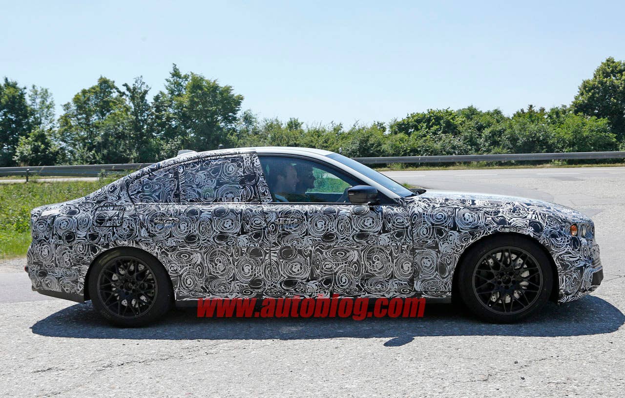 camouflaged bmw m5 spy shots profile