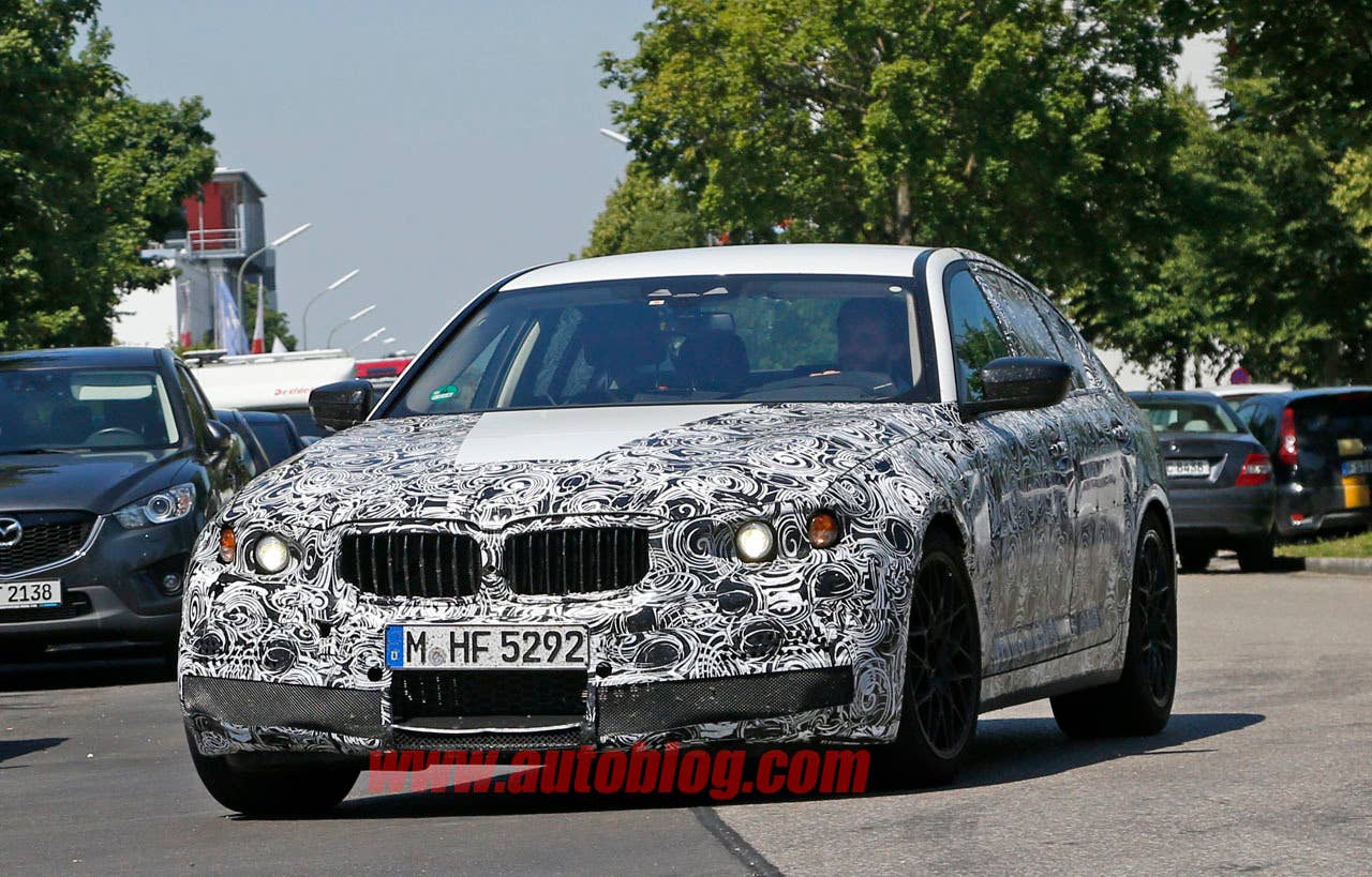 camouflaged bmw m5 spy shots grille