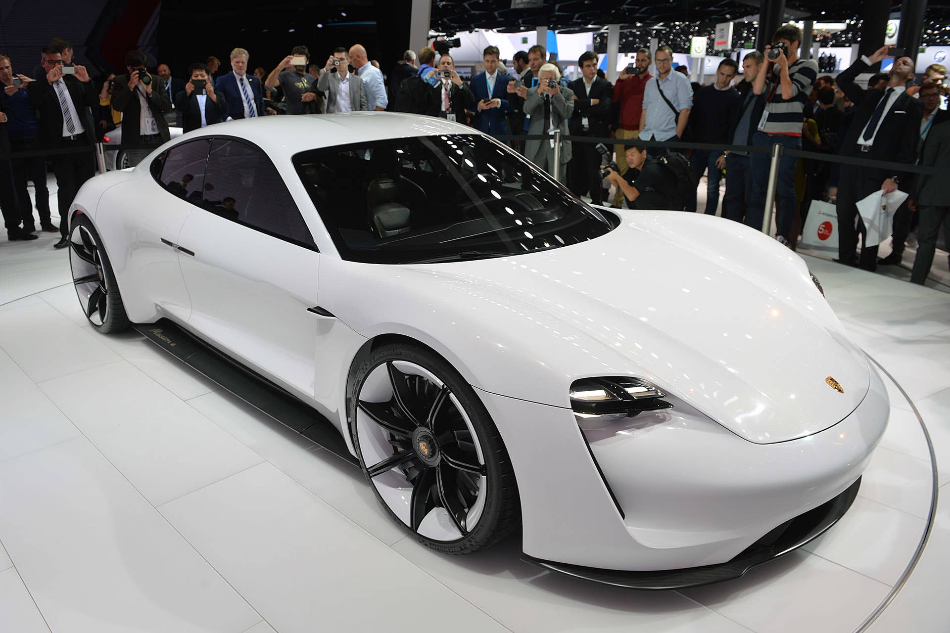 The Porsche Mission E concept, showed off at the 2015 Frankfurt Motor Show, front three-quarter view.