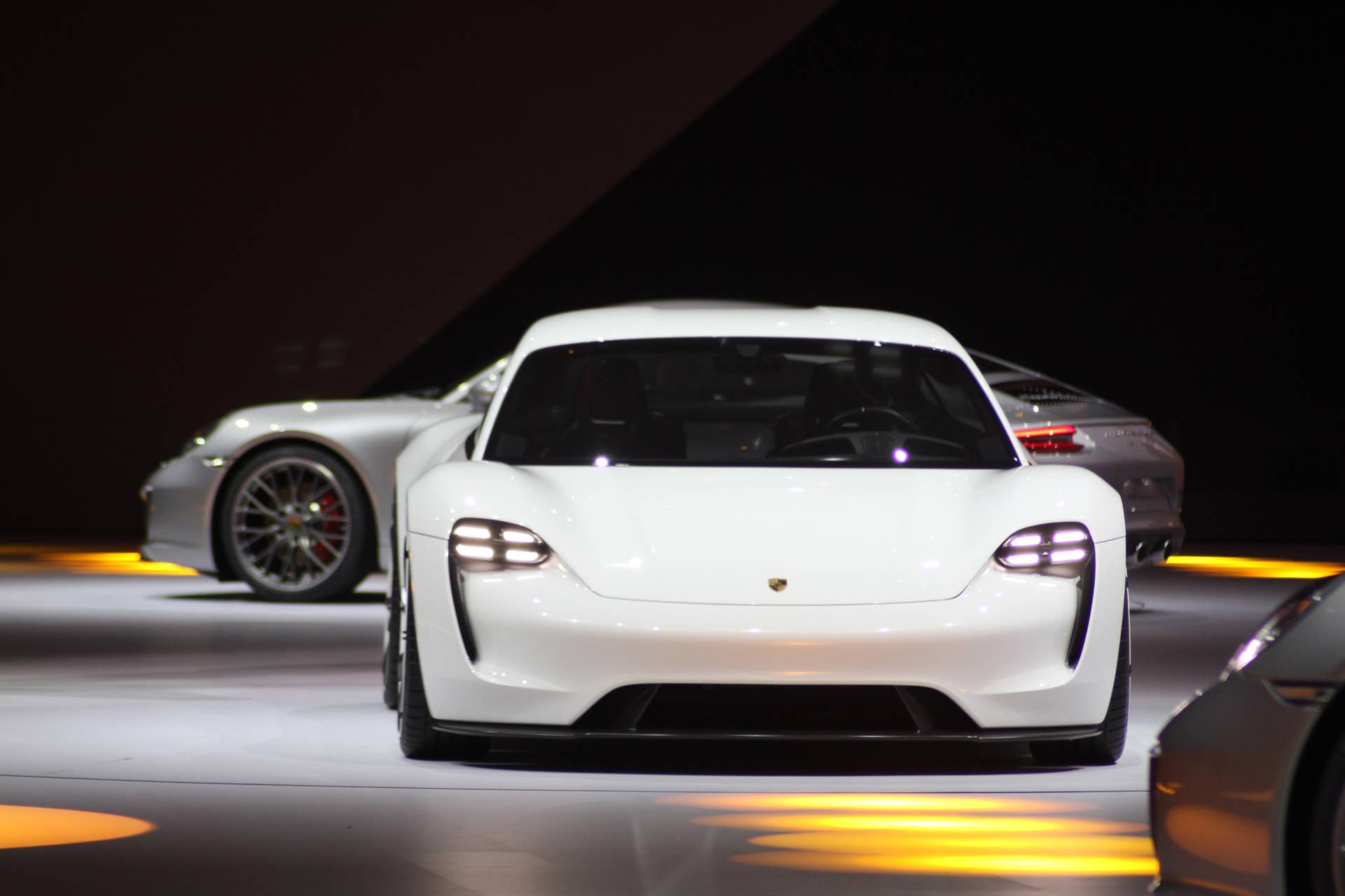 The electric Porsche Mission E concept, showed off at the Volkswagen Group Night ahead of the 2015 Frankfurt Motor Show, front view.