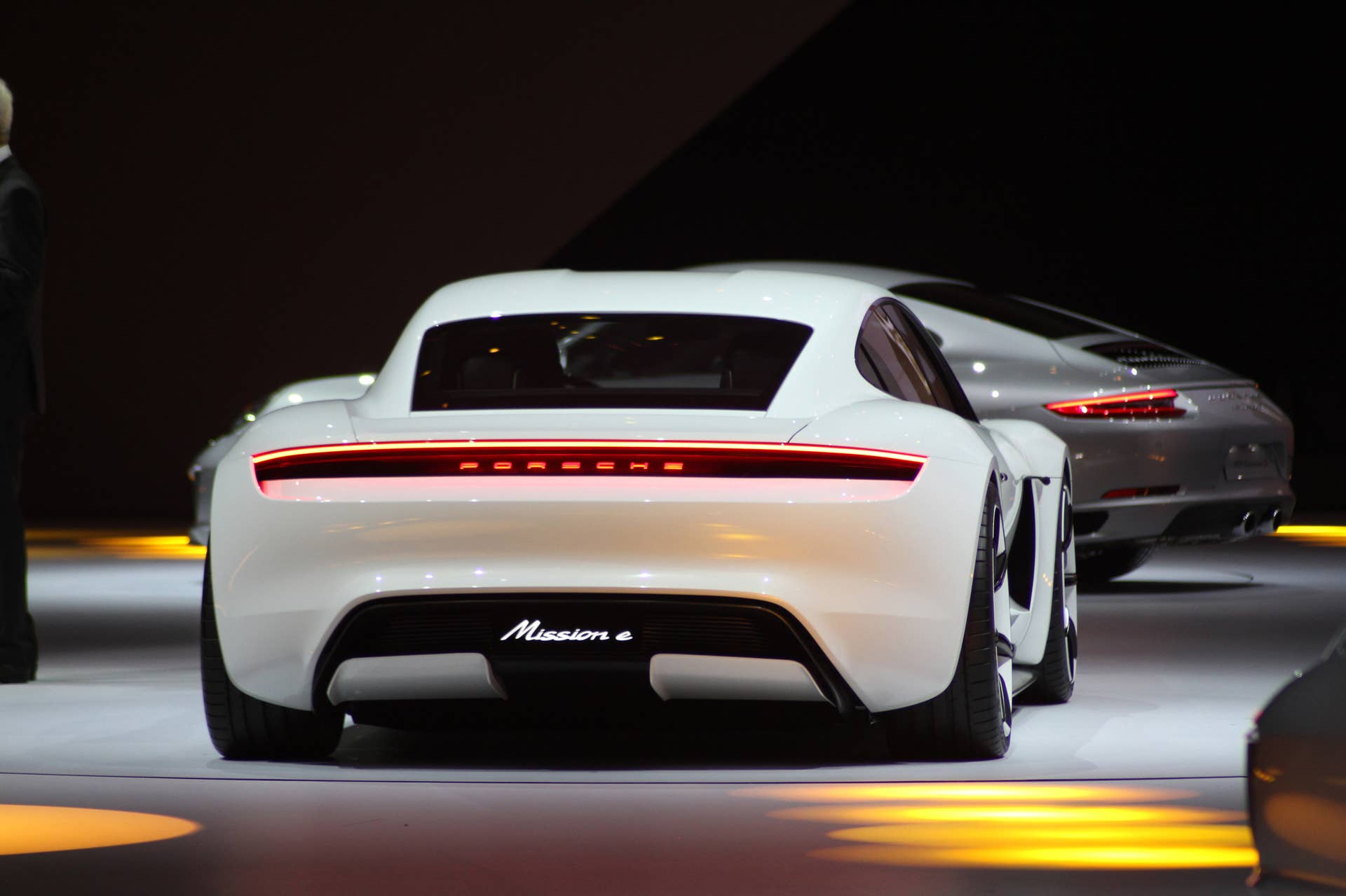 The electric Porsche Mission E concept, showed off at the Volkswagen Group Night ahead of the 2015 Frankfurt Motor Show, long view of the rear.