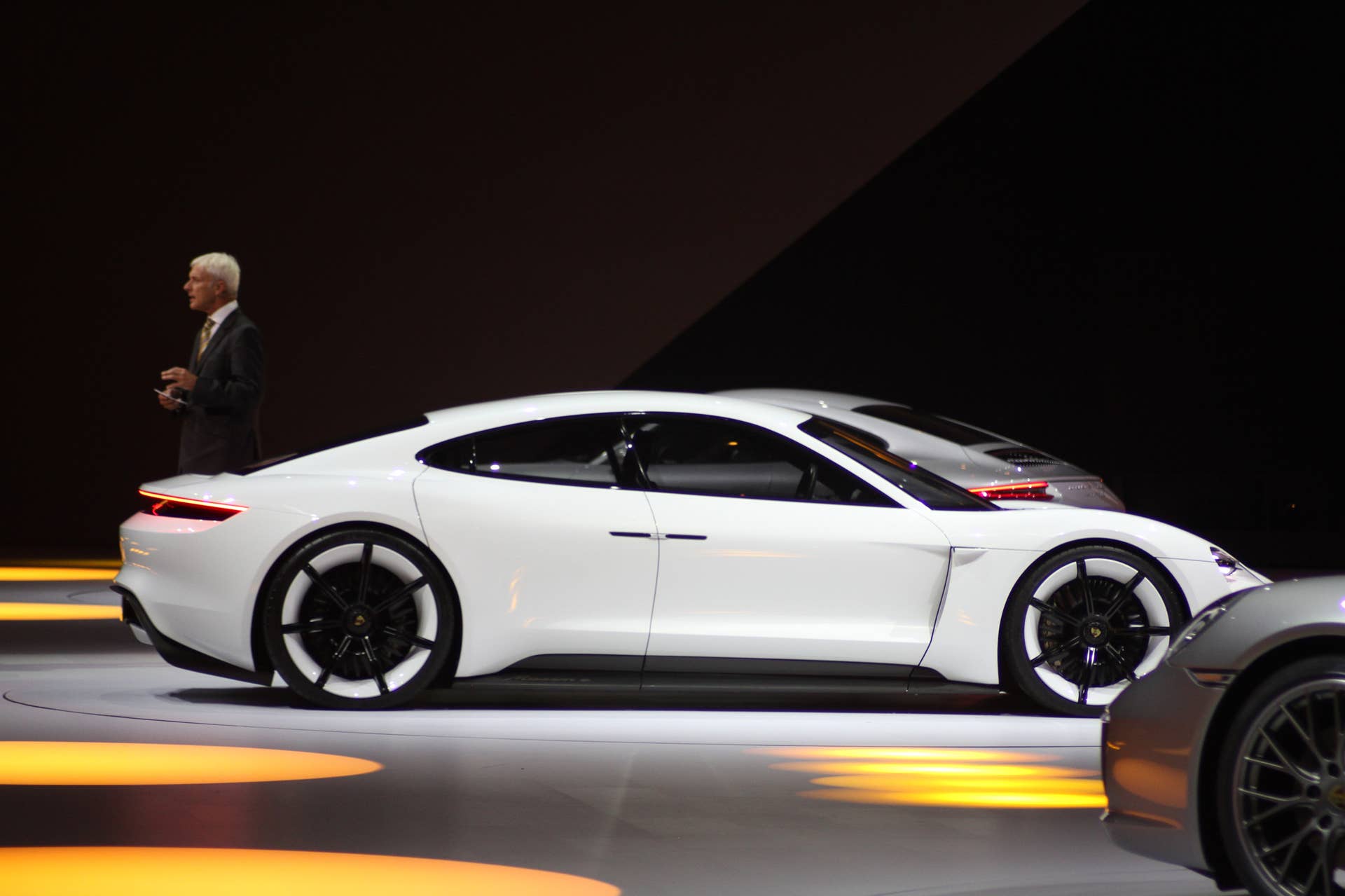 The electric Porsche Mission E concept, showed off at the Volkswagen Group Night ahead of the 2015 Frankfurt Motor Show, side view.