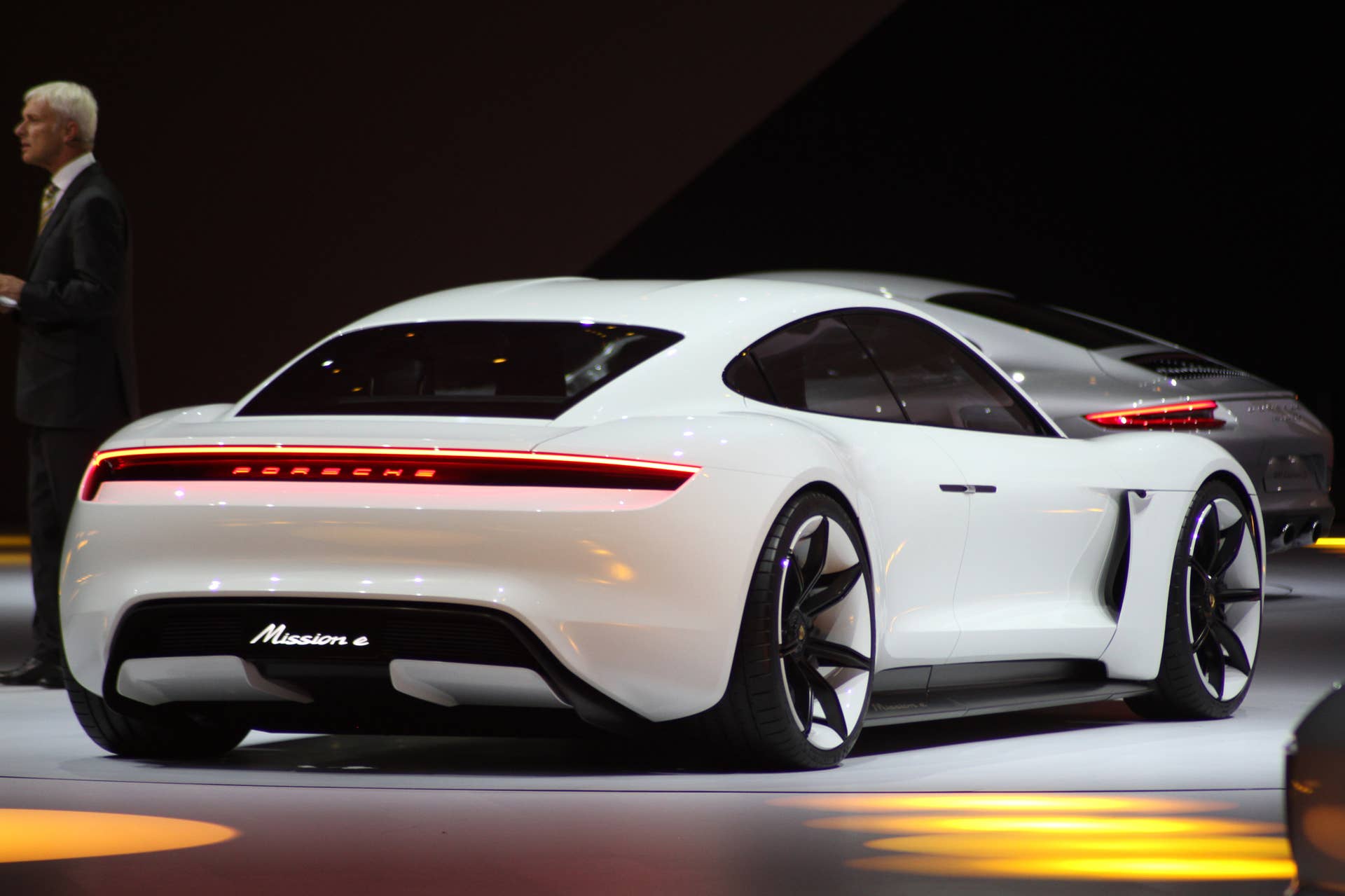 The electric Porsche Mission E concept, showed off at the Volkswagen Group Night ahead of the 2015 Frankfurt Motor Show, rear three-quarter, passenger's side.