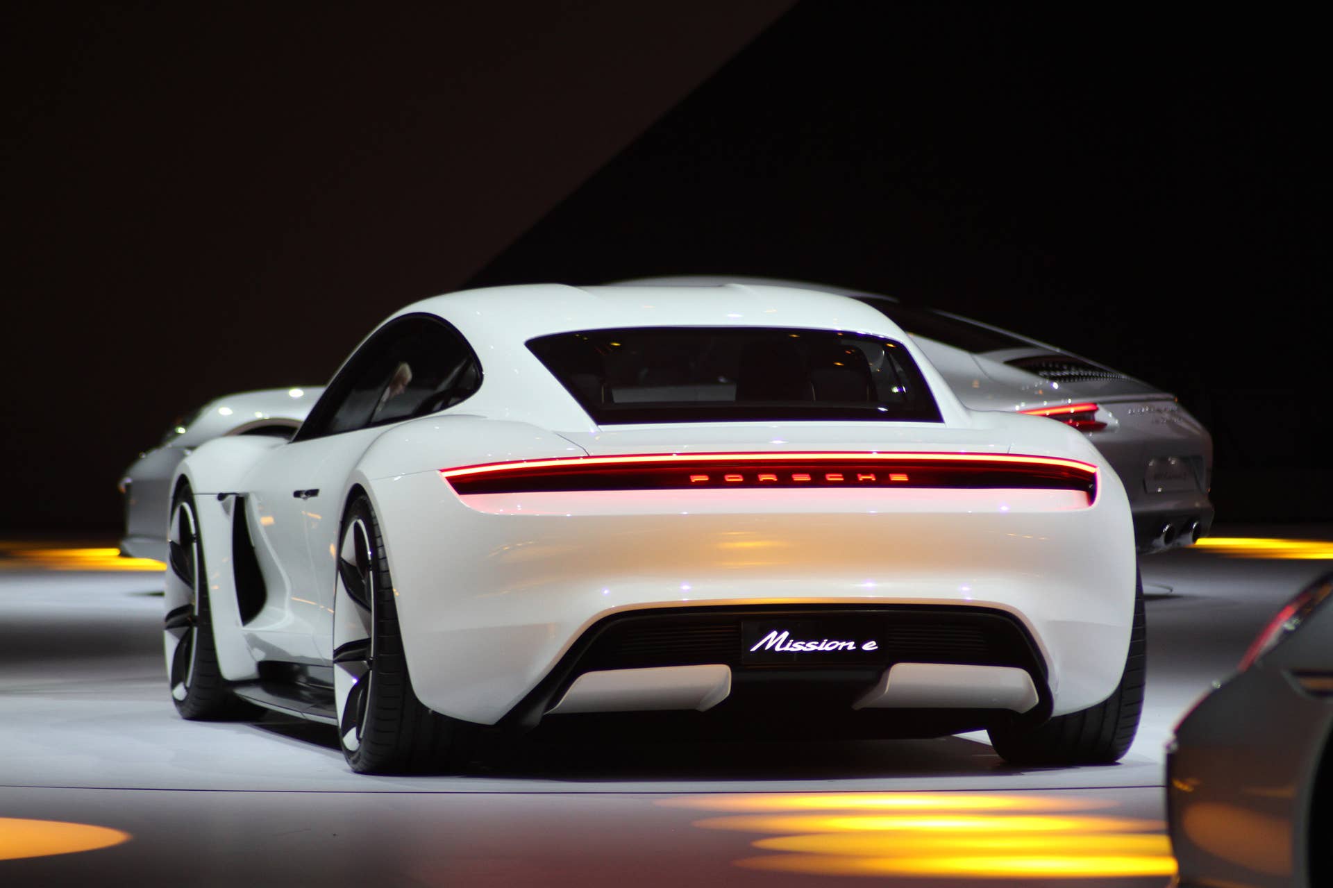 The electric Porsche Mission E concept, showed off at the Volkswagen Group Night ahead of the 2015 Frankfurt Motor Show, rear view.