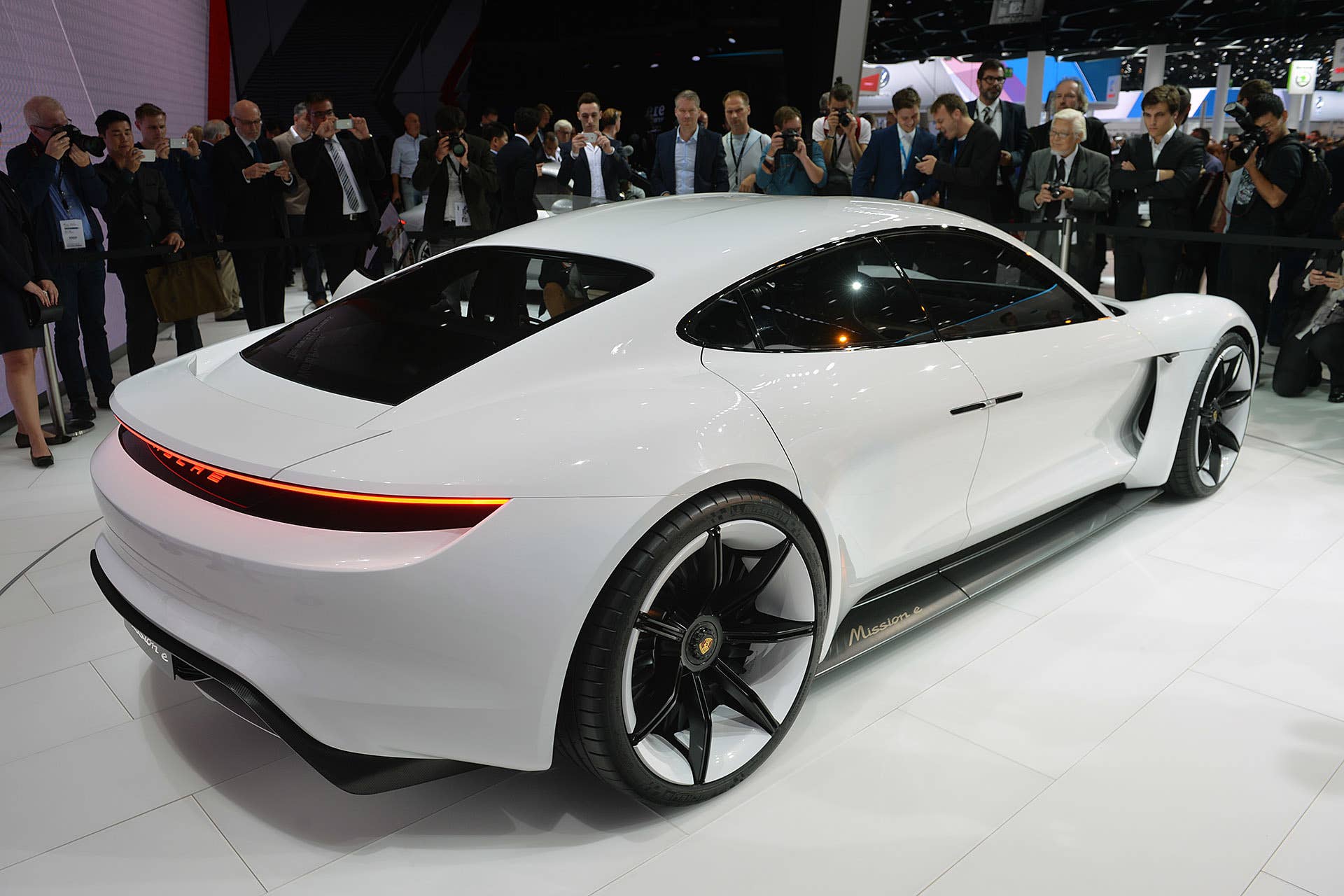 The Porsche Mission E concept, showed off at the 2015 Frankfurt Motor Show, rear three-quarter view.