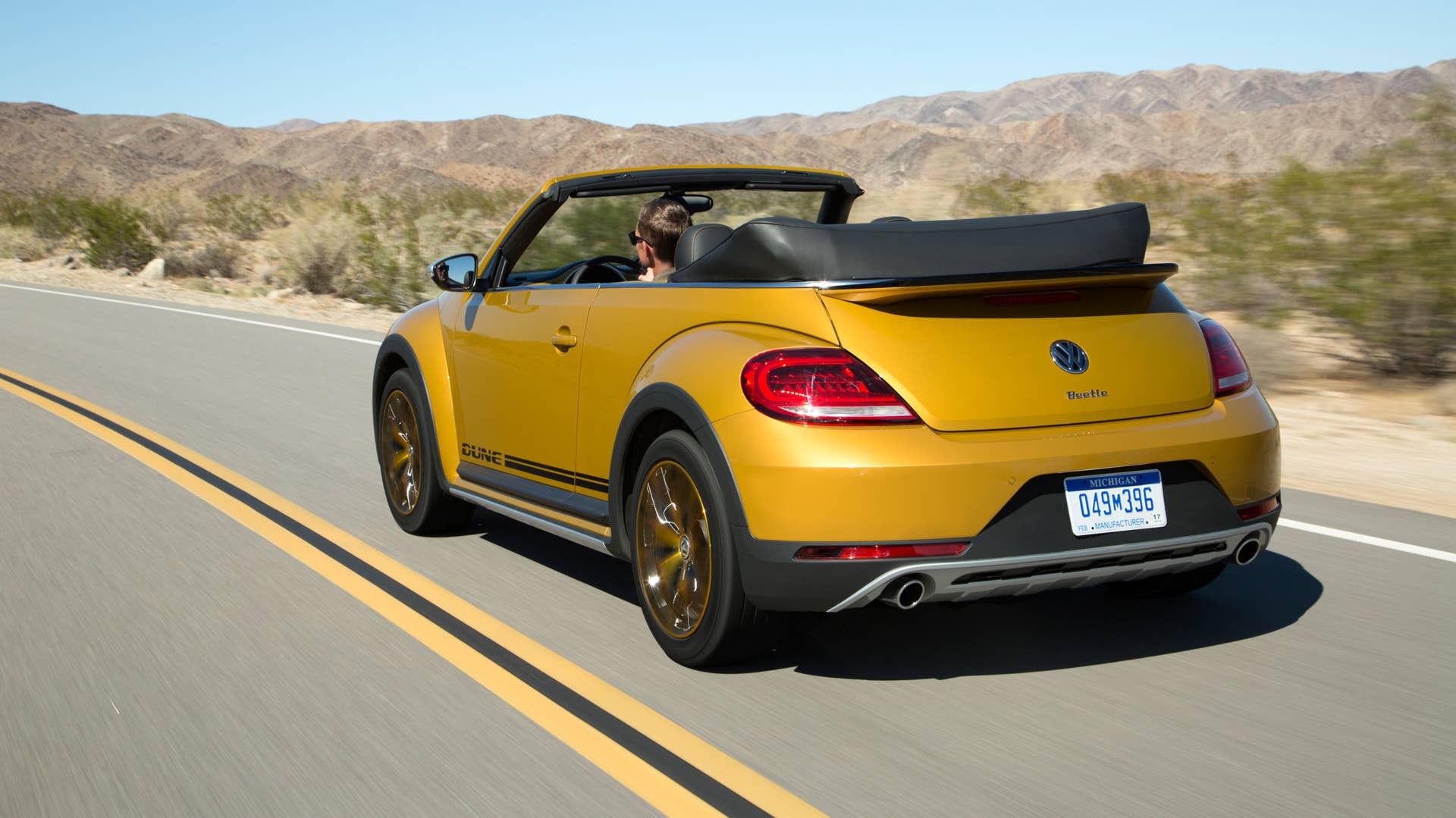 vw beetle dune convertible rear three quarters
