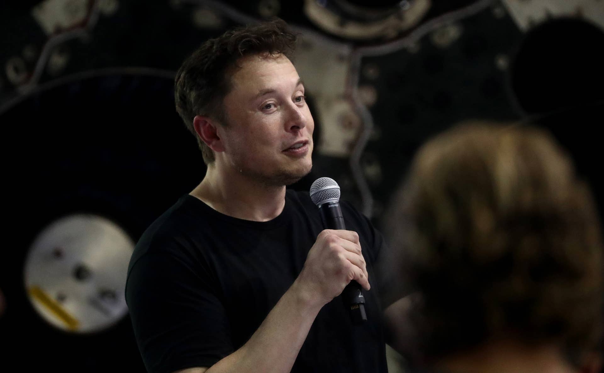 HAWTHORNE, CA - SEPTEMBER 17: SpaceX CEO Elon Musk speaks at a press conference where he announced the Japanese billionaire chosen by the company to fly around the moon, on September 17, 2018 in Hawthorne, California. If the project is successful Yusaka Maezawa would become the first private citizen to fly around the moon. (Photo by Mario Tama/Getty Images)
