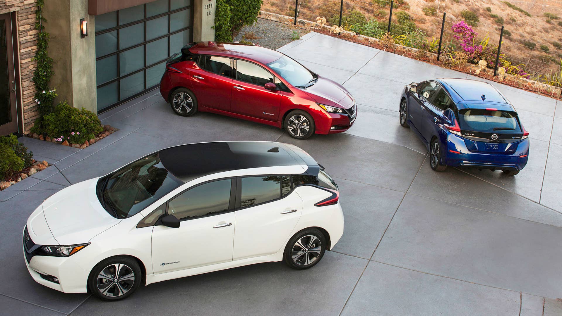 Three 2019 Nissan Leaf parked