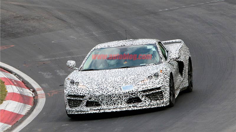 The mid-engined 2020 Chevy Corvette tests at the Nubugring, front three-quarter view.