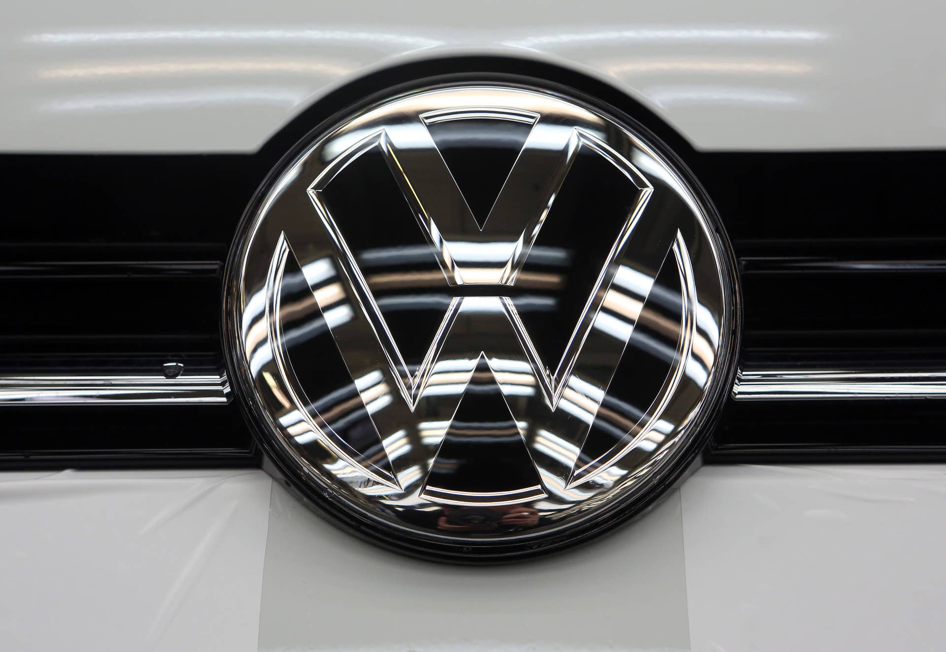 WOLFSBURG, GERMANY - MARCH 09: A logo is seen on a Golf 7 automobile at the Volkswagen (VW) factory on March 9, 2017 in Wolfsburg, Germany. The company, whose core brand, thanks to job cuts and reduction of overhead costs, is expected to improve profitability as well as market share this year, releases its earnings for its 12 brands on March 14. The auto manufacturer additionally benefitted from record deliveries of Audi and Porsche models last year. (Photo by Adam Berry/Getty Images)